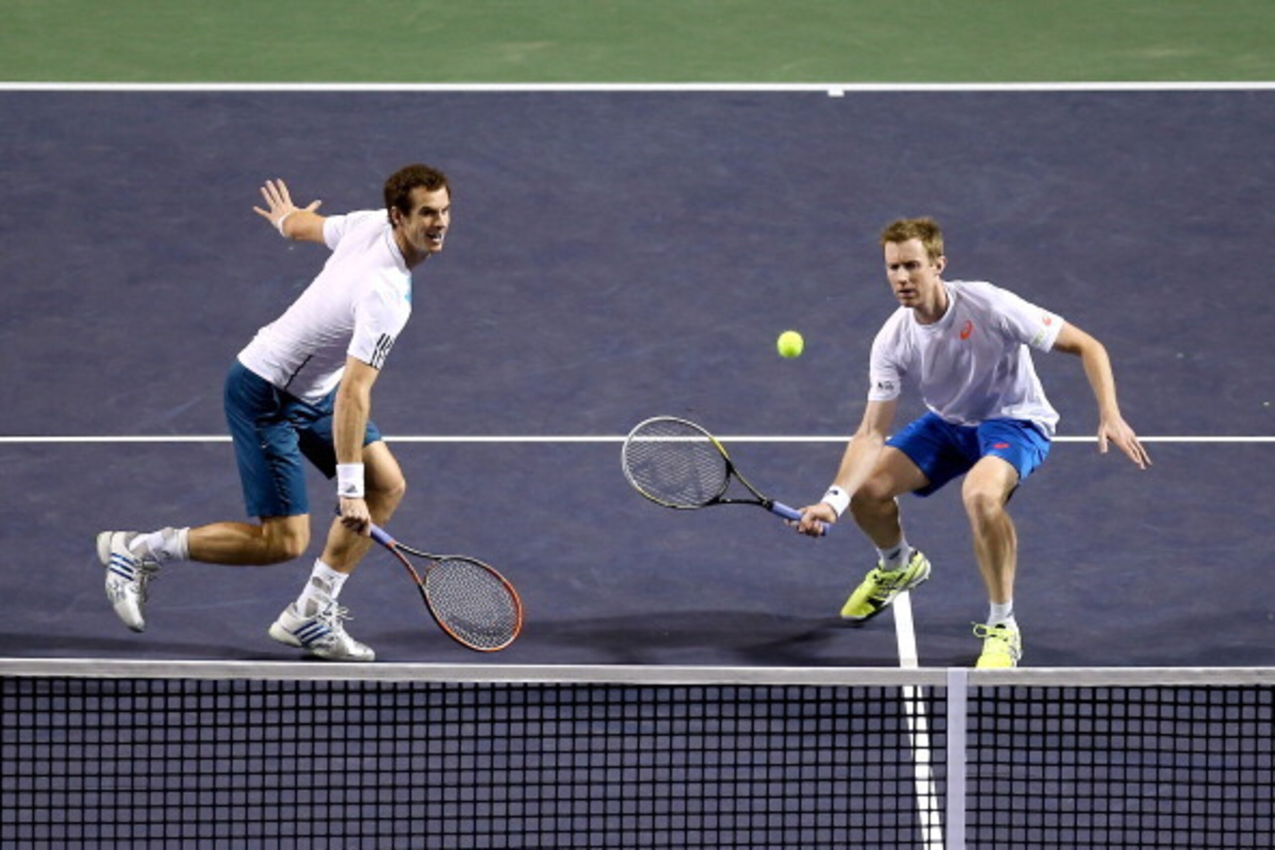 INDIAN WELLS, CA - MARCH 07:  Andy Murray and Jonathan Murray of Great Britain play Juan Monoco of Argentina and Gael Monfils of France during the BNP Parabas Open at the Indian Wells Tennis Garden on March 7, 2014 in Indian Wells, California.  (Photo by 