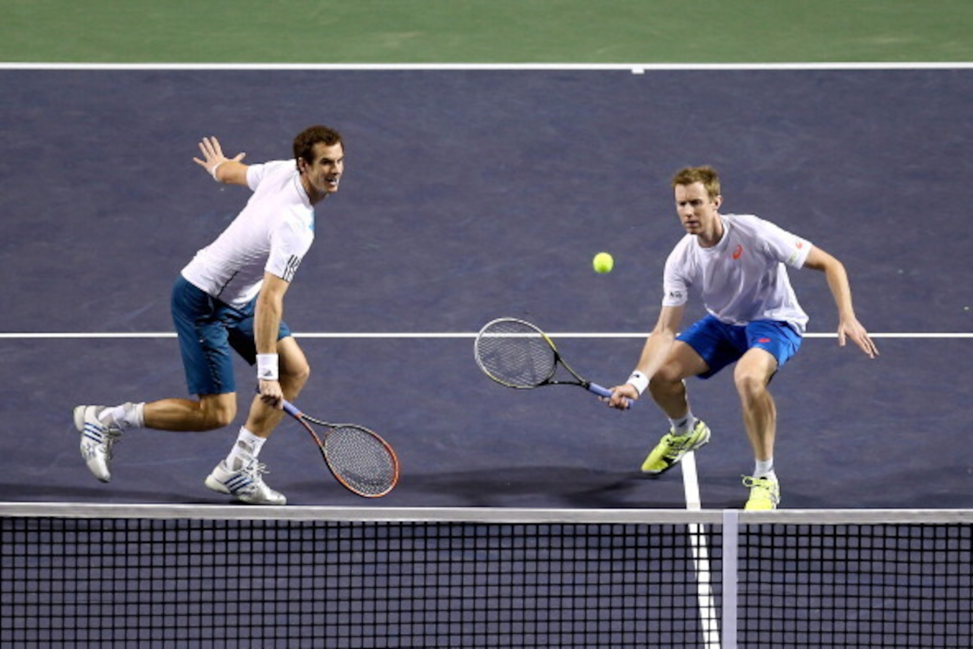 INDIAN WELLS, CA - MARCH 07:  Andy Murray and Jonathan Murray of Great Britain play Juan Monoco of Argentina and Gael Monfils of France during the BNP Parabas Open at the Indian Wells Tennis Garden on March 7, 2014 in Indian Wells, California.  (Photo by 