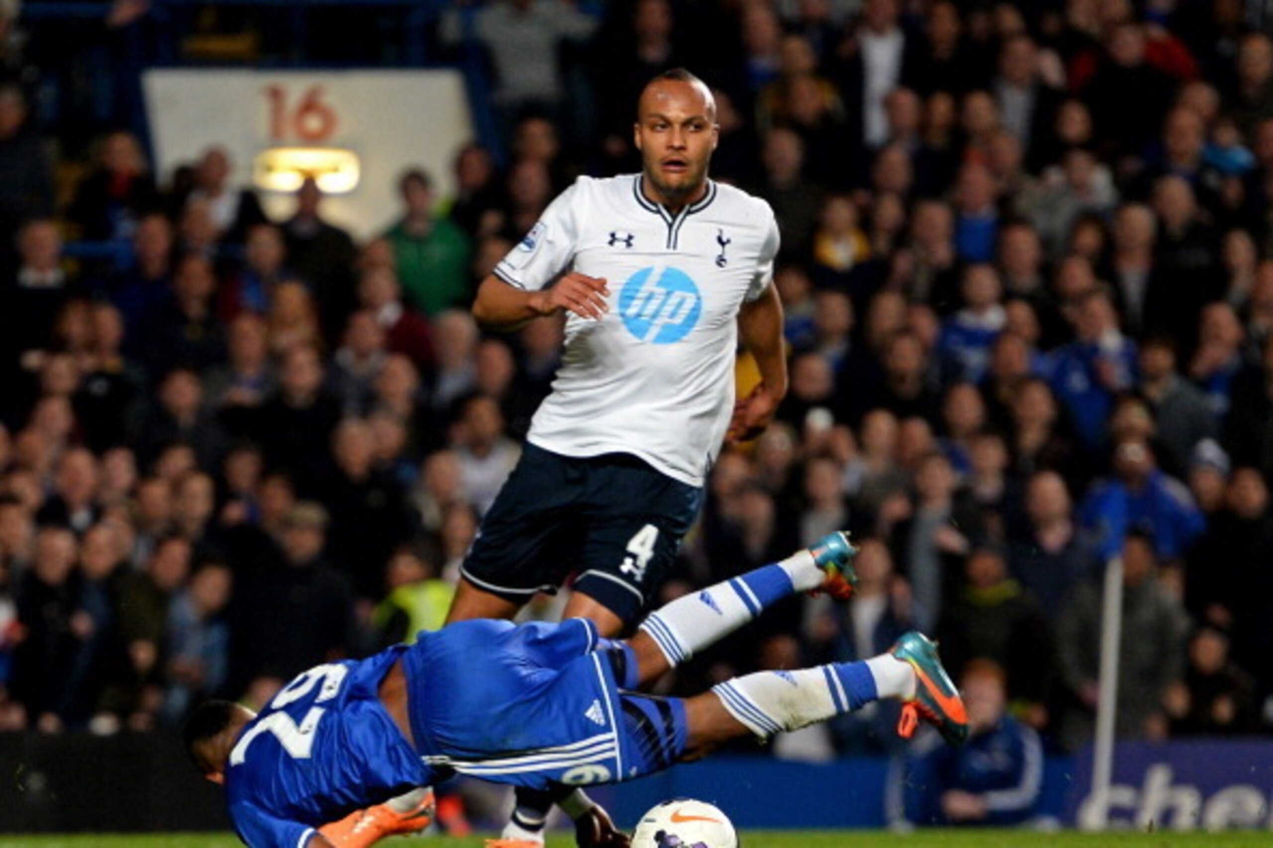 LONDON, ENGLAND - MARCH 08:  Samuel Eto'o of Chelsea is brought down by Younes Kaboul of Spurs during the Barclays Premier League match between Chelsea and Tottenham Hotspur at Stamford Bridge on March 8, 2014 in London, England. Kaboul was later shown th