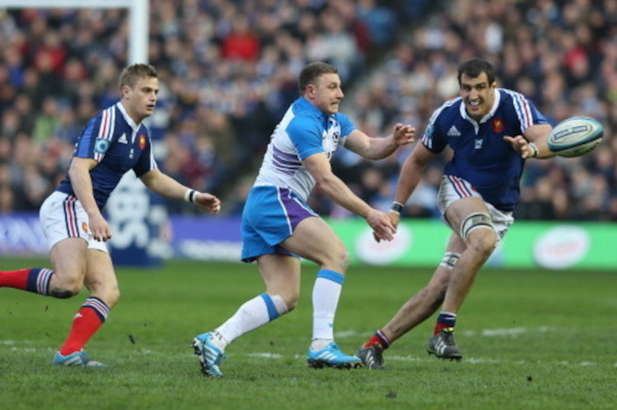 EDINBURGH, SCOTLAND - MARCH 08:  Duncan Weir of Scotand passes the ball during the RBS Six Nations match between Scotland and France at Murrayfield Stadium on March 8, 2014 in Edinburgh, Scotland.  (Photo by David Rogers/Getty Images)