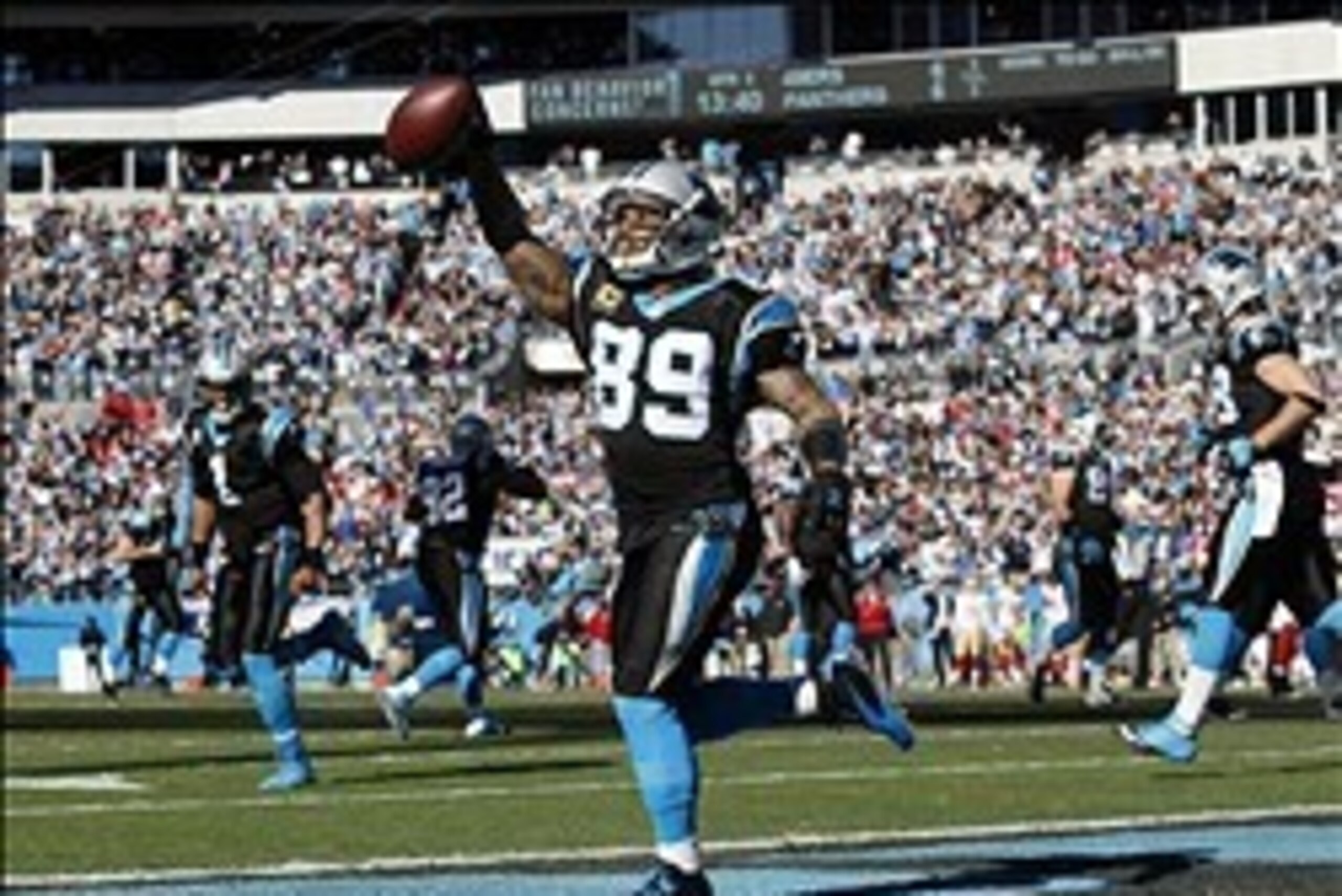 Jan 12, 2014; Charlotte, NC, USA; Carolina Panthers wide receiver Steve Smith (89) celebrates a touchdown against the San Francisco 49ers during the first half of the 2013 NFC divisional playoff football game at Bank of America Stadium. Mandatory Credit: 