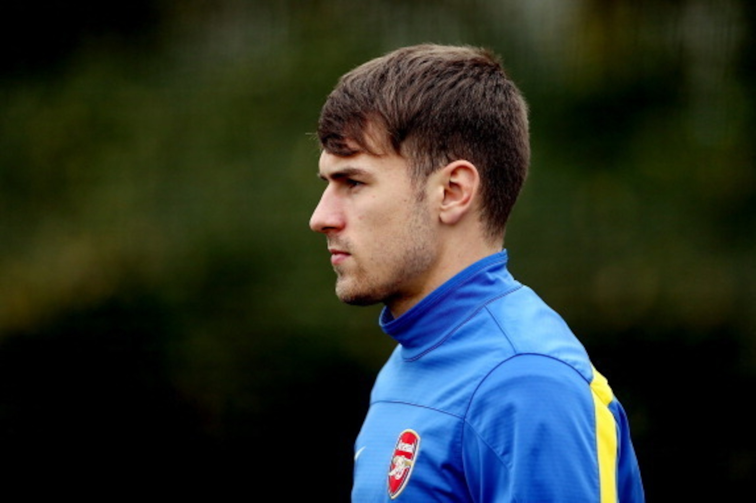 ST ALBANS, ENGLAND - DECEMBER 10:  Aaron Ramsey during an Arsenal training session ahead of their UEFA Champions League group F match against Napoli at London Colney on December 10, 2013 in St Albans, England.  (Photo by Scott Heavey/Getty Images)