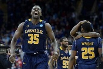 Mar 22, 2013; Kansas City, MO, USA; La Salle Explorers guard Rohan Brown (35) celebrates after beating the Kansas State Wildcats 63-61 during the second round of the 2013 NCAA tournament at the Sprint Center. Mandatory Credit: Peter G. Aiken-USA TODAY Spo