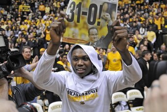 WICHITA, KS - MARCH 01:  Forward Cleanthony Early #11 of the Wichita State Shockers celebrates after beating the Missouri State Bears on March 1, 2014 at Charles Koch Arena in Wichita, Kansas.  Wichita State won 68-45.  (Photo by Peter Aiken/Getty Images)