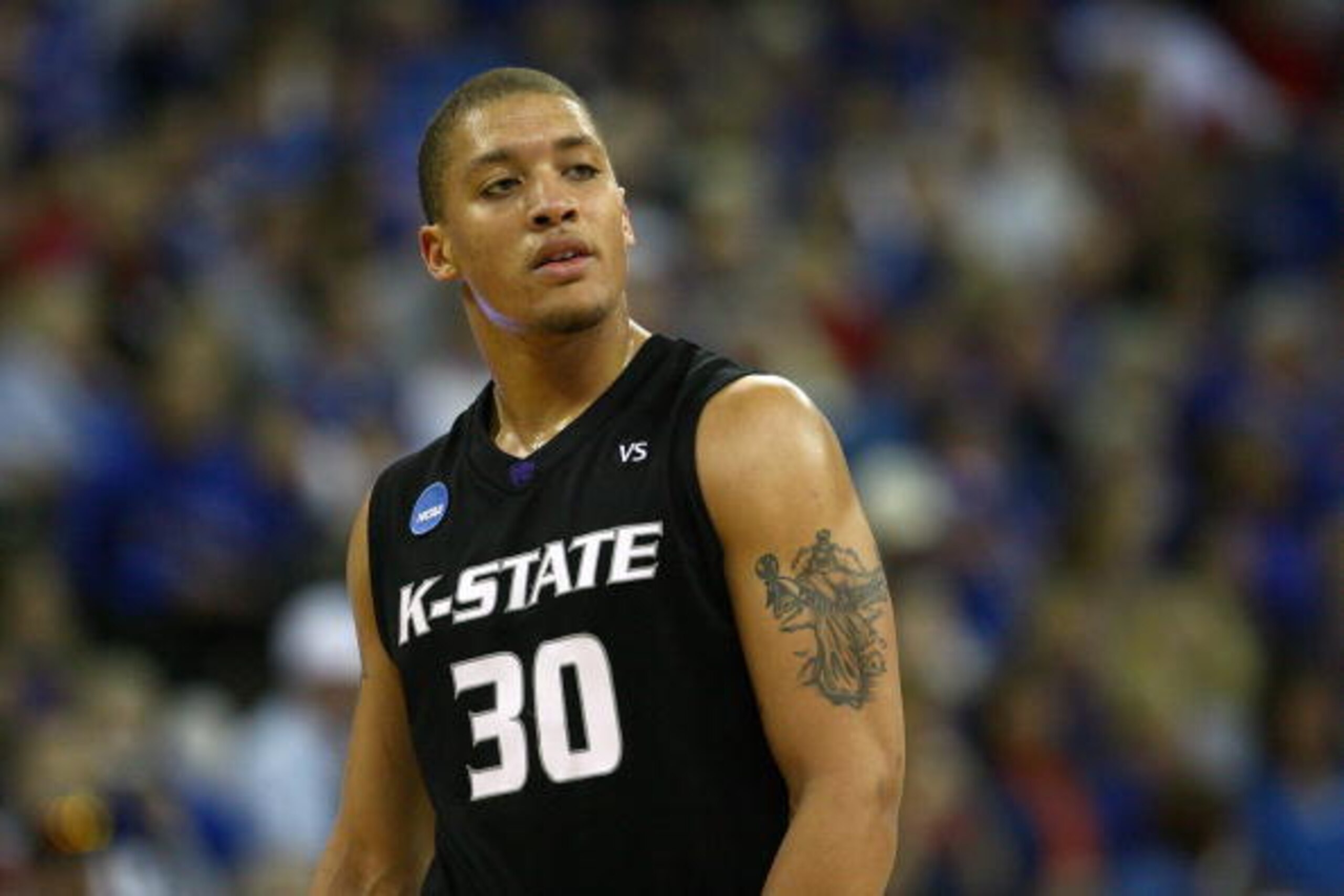 OMAHA, NE - MARCH 22:  Michael Beasley #30 of the Kansas State Wildcats looks on against the Wisconsin Badgers during the Midwest Region second round of the 2008 NCAA Men's Basketball Tournament on March 22, 2008 at the Qwest Center in Omaha, Nebraska. Ka