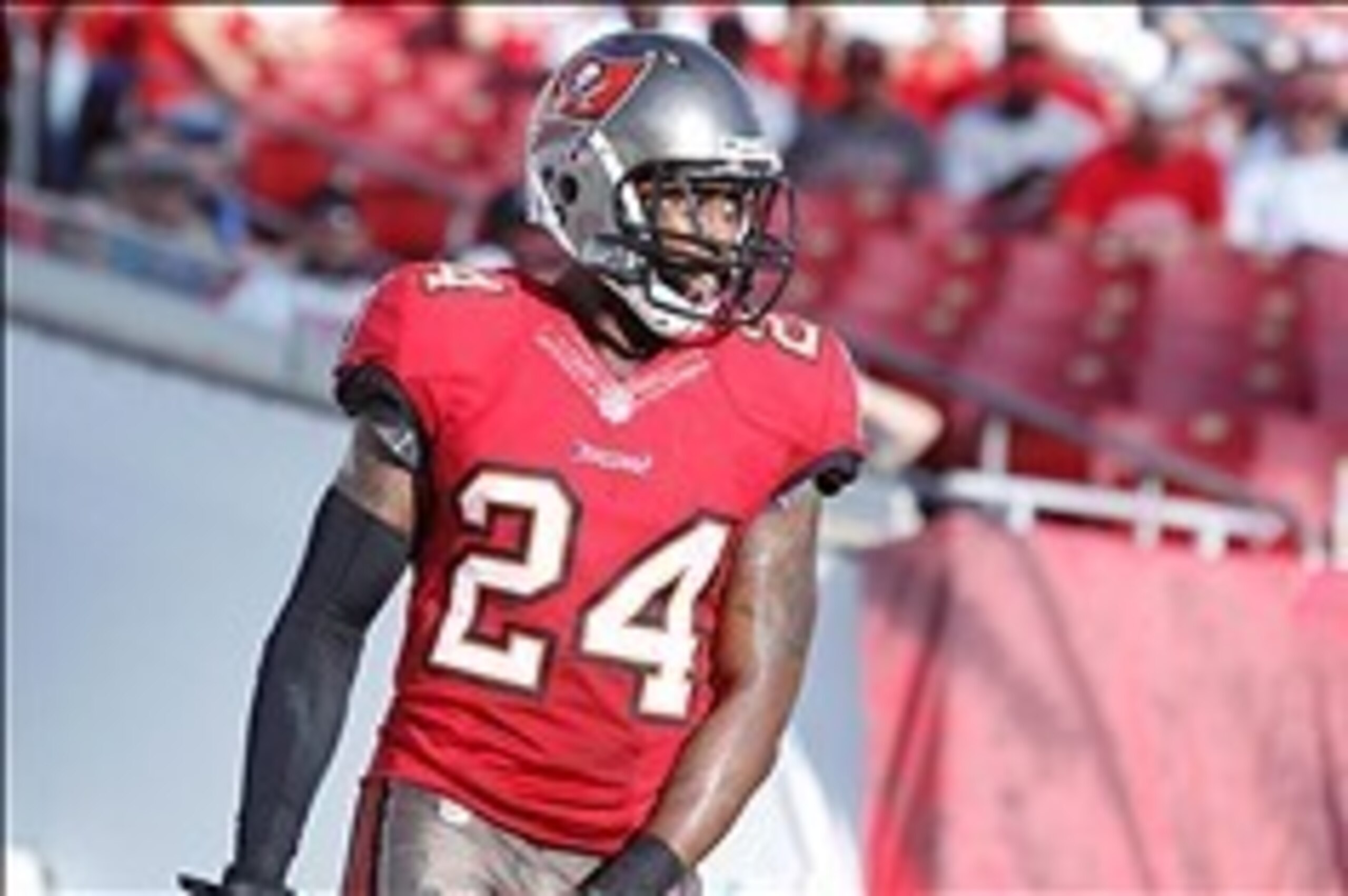Nov 17, 2013; Tampa, FL, USA; Tampa Bay Buccaneers cornerback Darrelle Revis (24) against the Atlanta Falcons during the second half at Raymond James Stadium. Tampa Bay Buccaneers defeated the Atlanta Falcons 41-28. Mandatory Credit: Kim Klement-USA TODAY