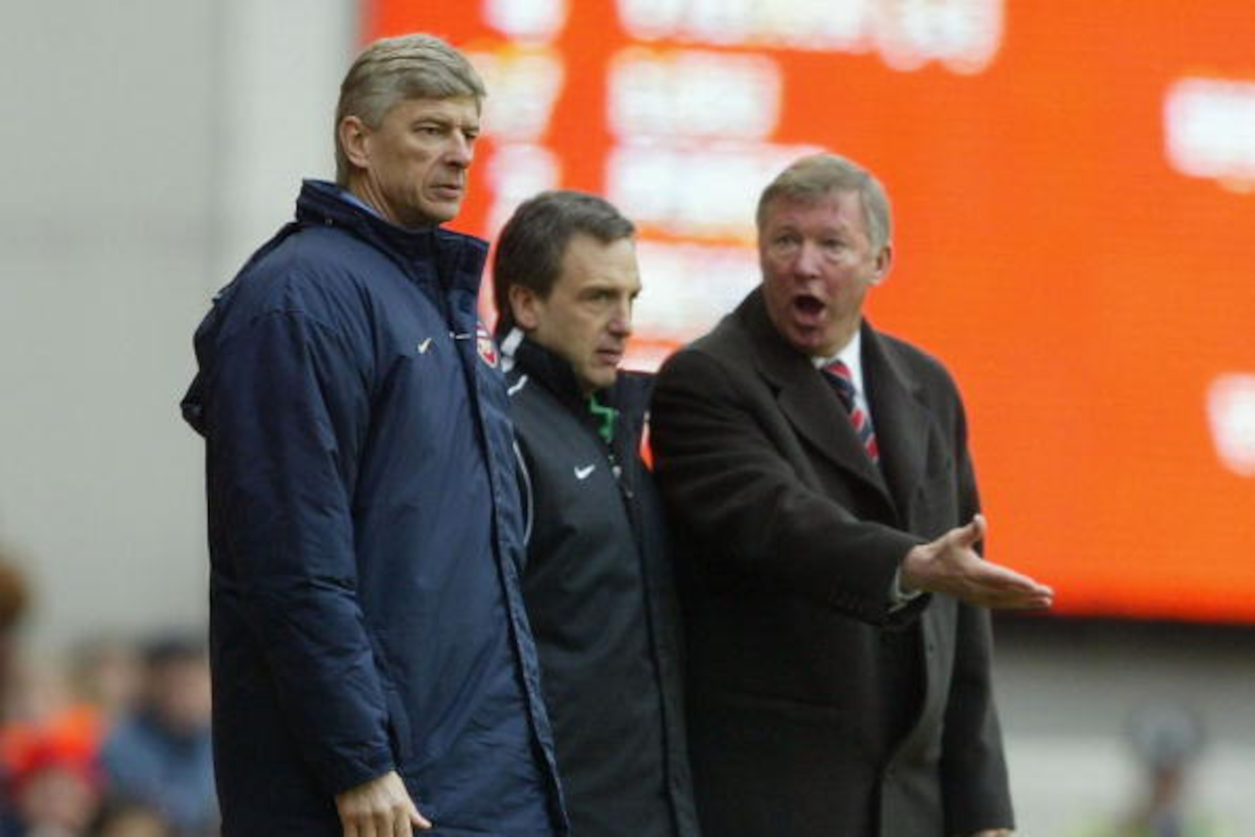 LONDON - MARCH 28:  Manager Arsene Wenger of Arsenal argues with manager Sir Alex Ferguson of Manchester United during the FA Barclaycard Premiership match between Arsenal and Manchester United at Highbury on March 28, 2004 in London.  (Photo by Clive Mas