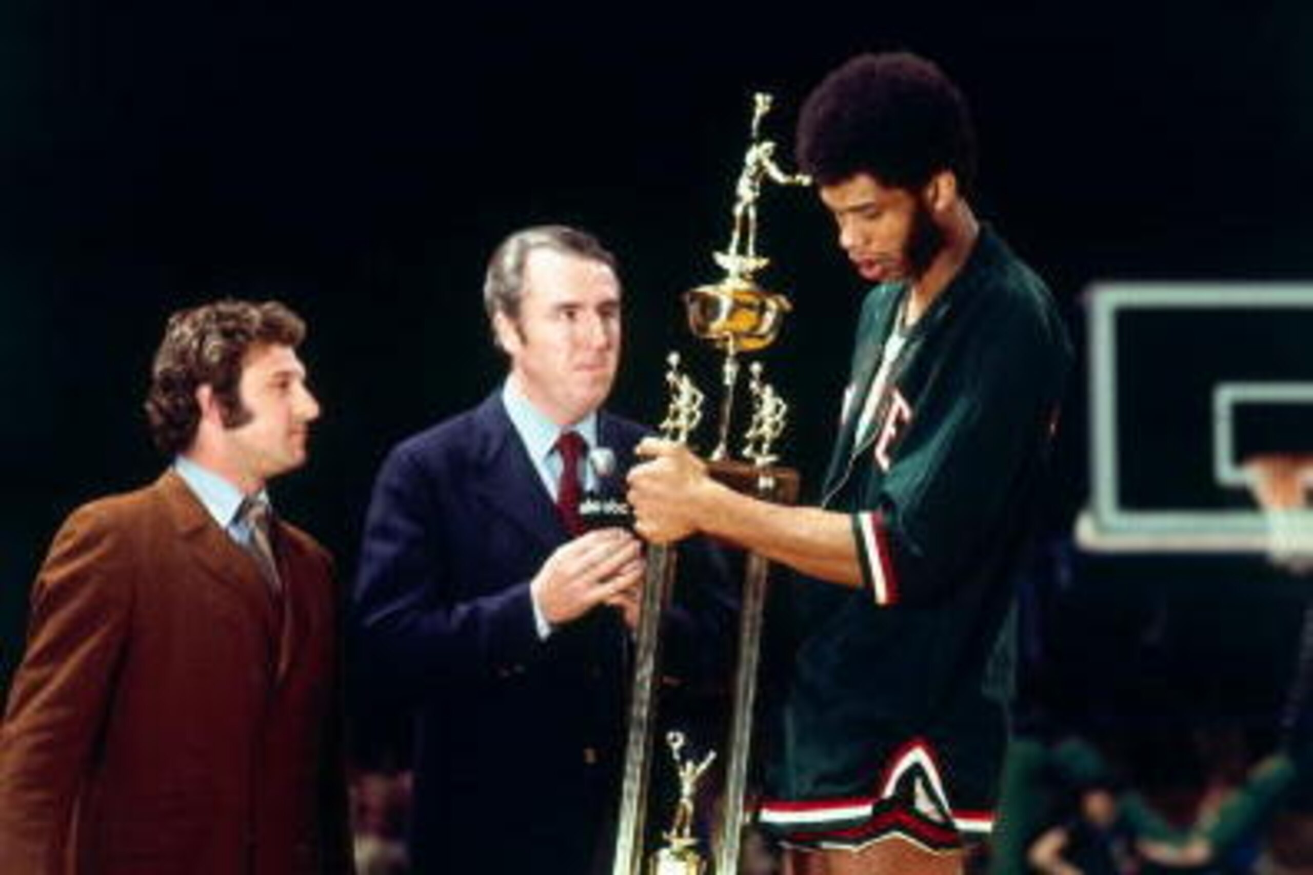 MILWAUKEE - 1971:  Kareem Abdul Jabbar #33 of the Milwaukee Bucks receives the Most Valuable Player Award during the 1971 season at the MECCA Arena in Milwaukee, Wisconsin. NOTE TO USER: User expressly acknowledges that, by downloading and or using this p