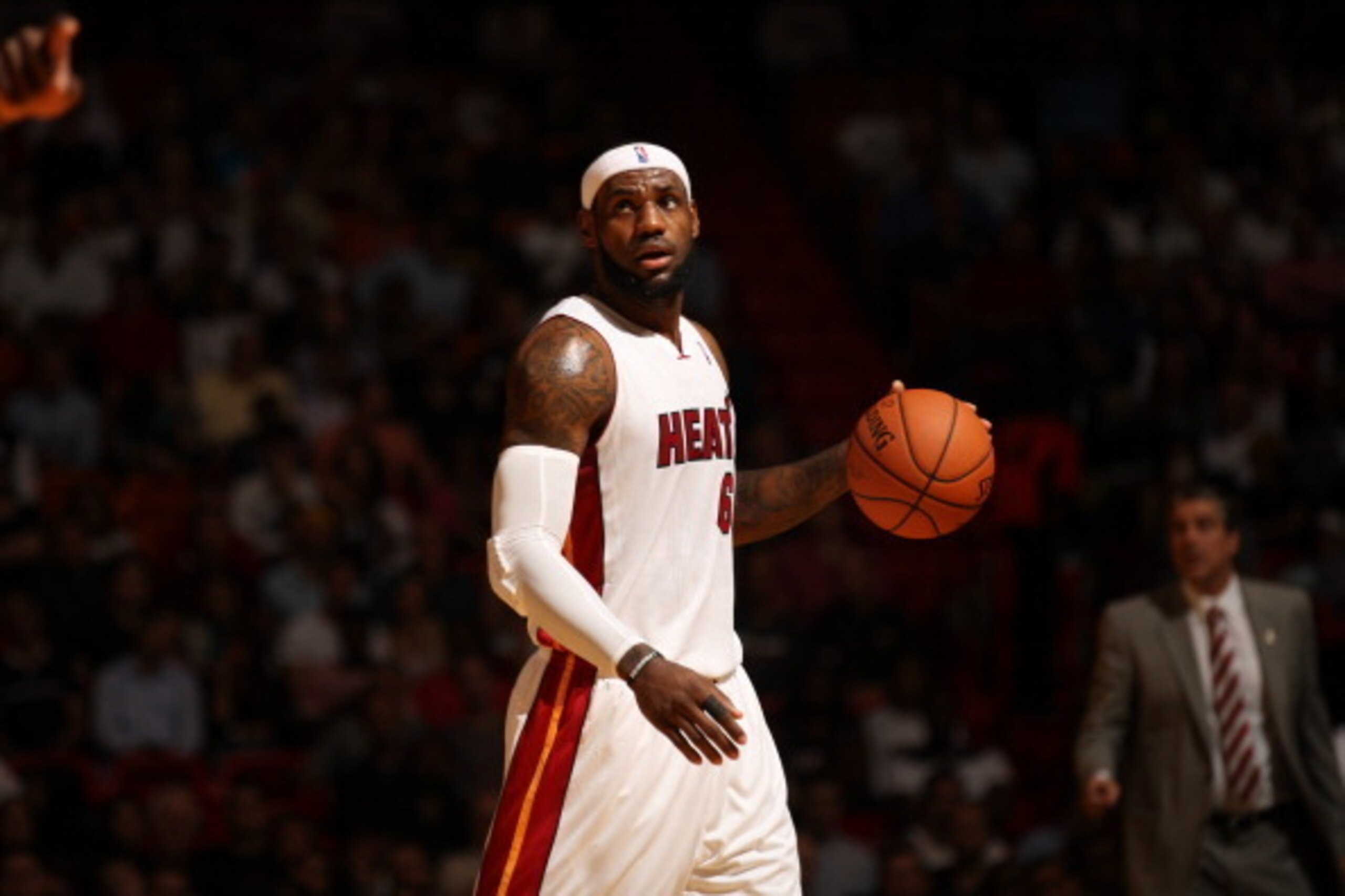 MIAMI, FL - March 10: LeBron James #6 of the Miami Heat dribbles up the court against the Washington Wizards at the American Airlines Arena in Miami, Florida on March 10 2014. NOTE TO USER: User expressly acknowledges and agrees that, by downloading and/o
