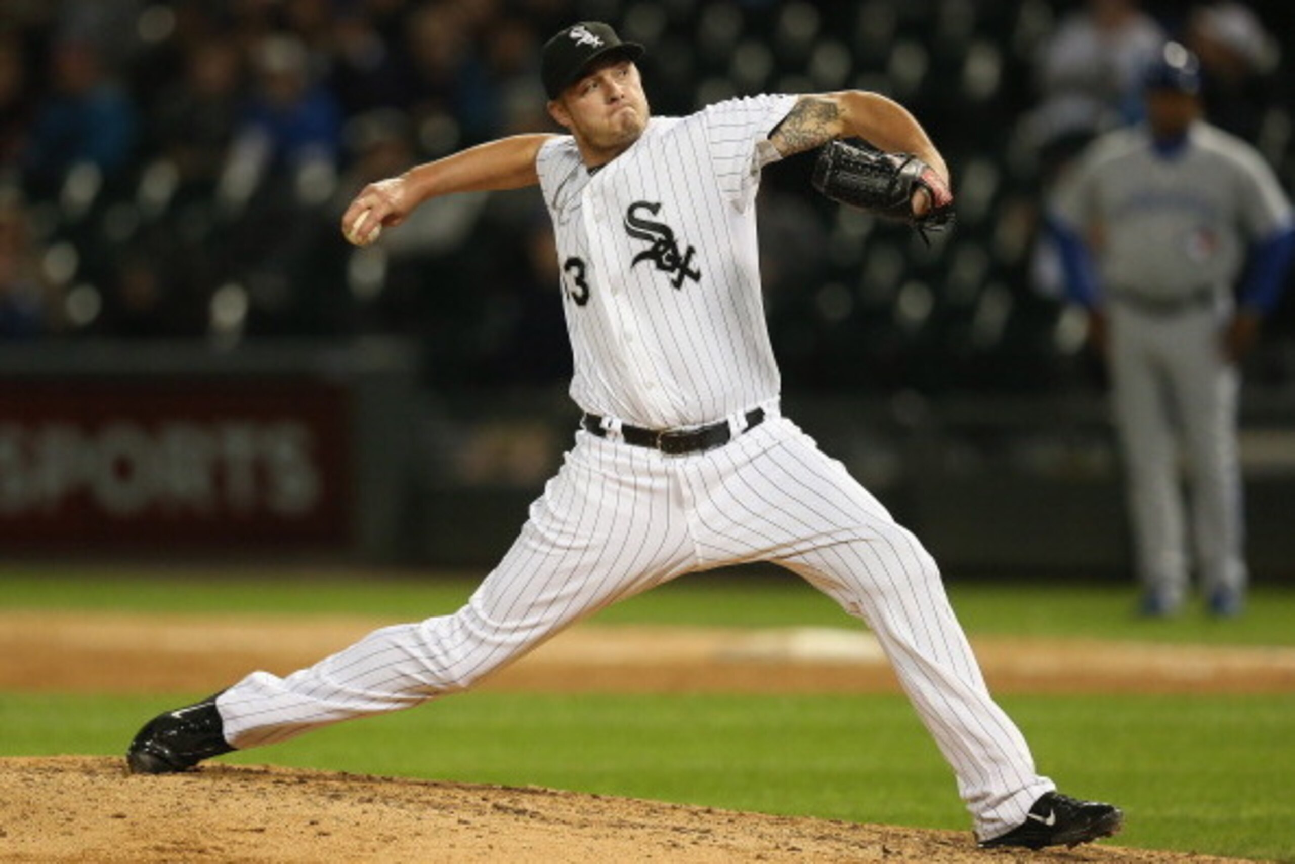 CHICAGO, IL - SEPTEMBER 23: Addison Reed #43 of the Chicago White Sox pitches in the 9th ining for a save against the Toronto Blue Jays at U.S. Cellular Field on September 23, 2013 in Chicago, Illinois. The White Sox defeated the Blue Jays 3-2. (Photo b CHICAGO, IL - SEPTEMBER 23: Addison Reed #43 of the Chicago White Sox pitches in the 9th ining for a save against the Toronto Blue Jays at U.S. Cellular Field on September 23, 2013 in Chicago, Illinois. The White Sox defeated the Blue Jays 3-2. (Photo b
