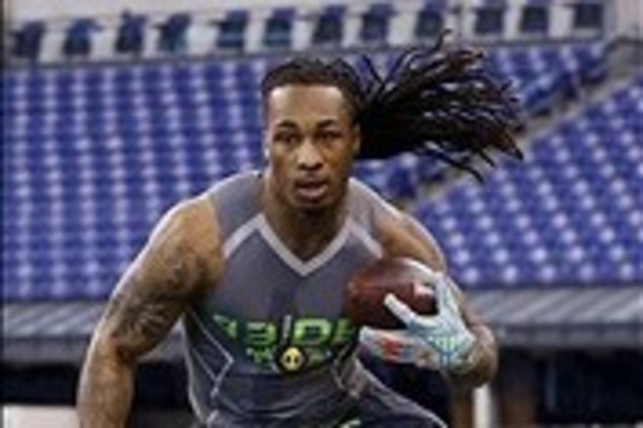 Feb 25, 2014; Indianapolis, IN, USA; Louisville Cardinals defensive back Calvin Pryor runs with the ball during the 2014 NFL Combine at Lucas Oil Stadium. Mandatory Credit: Brian Spurlock-USA TODAY Sports