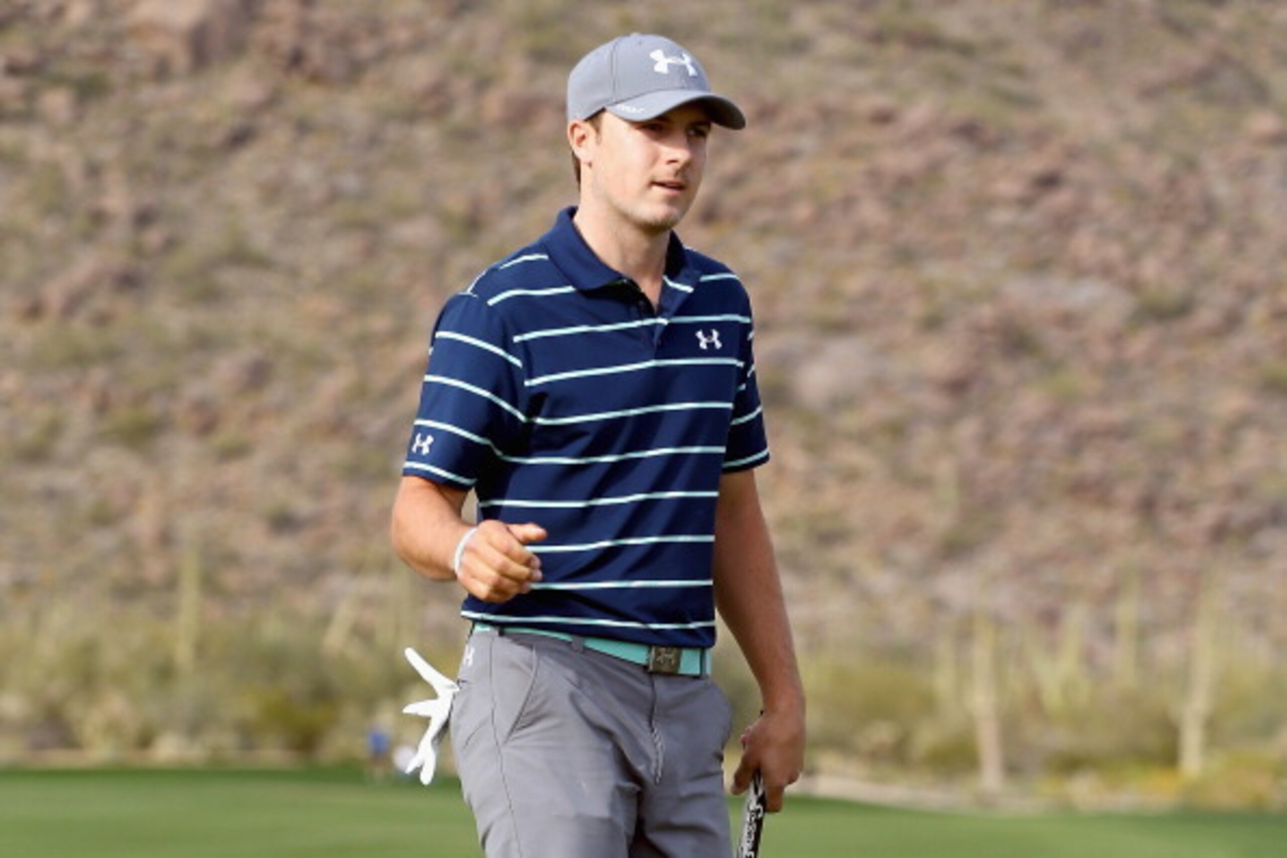 MARANA, AZ - FEBRUARY 21:  Jordan Spieth reacts  after making a putt to win the hole to win the match against Matt Kuchar (not in photo) 2 and 1 during the third round of the World Golf Championships - Accenture Match Play Championship at The Golf Club at
