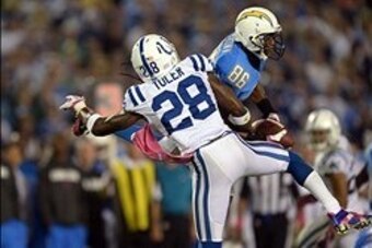 Oct 14, 2013; San Diego, CA, USA; San Diego Chargers receiver Vincent Brown (86) makes a catch while defended by Indianapolis Colts cornerback Greg Toler (28) at Qualcomm Stadium. Mandatory Credit: Kirby Lee-USA TODAY Sports