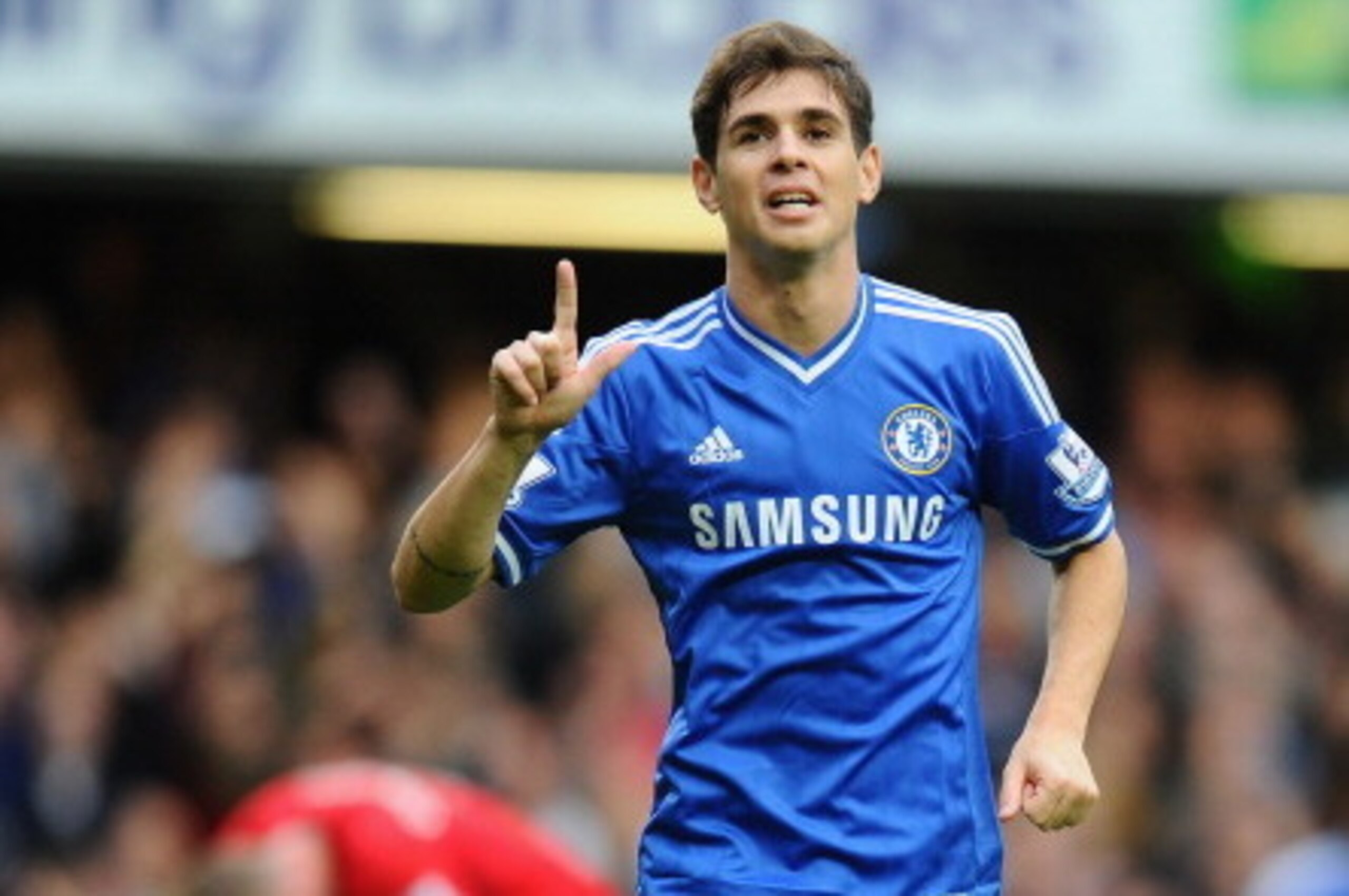 LONDON, ENGLAND - OCTOBER 19:  Oscar of Chelsea celebrates scoring his side's third goal during the Barclays Premier League match between Chelsea and Cardiff City at Stamford Bridge on October 19, 2013 in London, England.  (Photo by Mike Hewitt/Getty Imag
