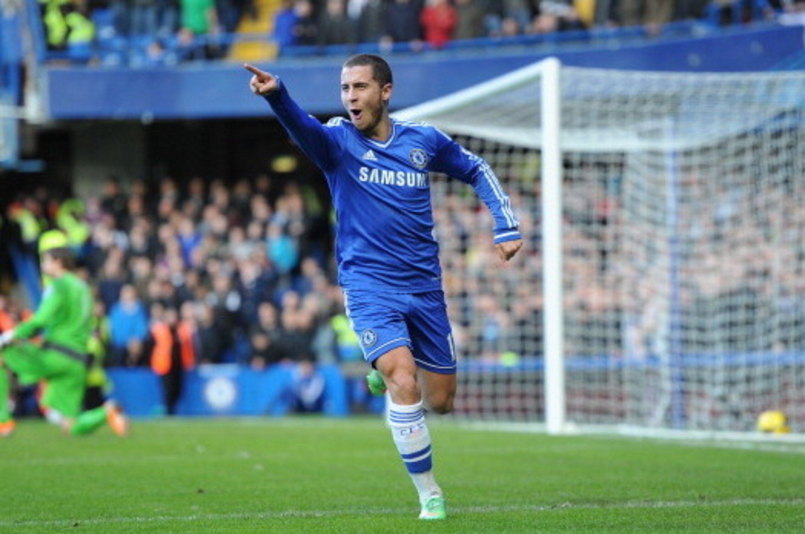 LONDON, ENGLAND - FEBRUARY 08:  Eden Hazard of Chelsea celebrates after scoring his first goal during the Barclays Premier League match between Chelsea and Newcastle United at Stamford Bridge on February 8, 2014 in London, England.  (Photo by Mike Hewitt/