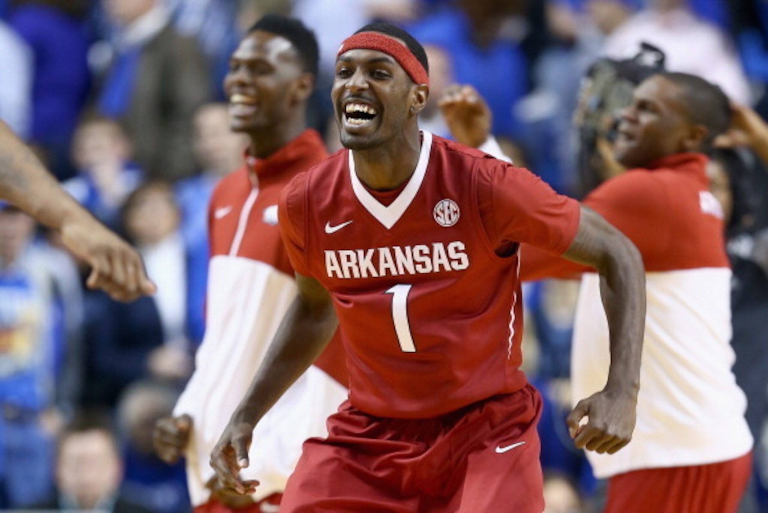 LEXINGTON, KY - FEBRUARY 27:  Madracus Wade #1 of the Arkansas Razorbacks celebrates after the 71-67 OT win over the Kentucky Wildcats at Rupp Arena on February 27, 2014 in Lexington, Kentucky.  (Photo by Andy Lyons/Getty Images)