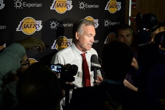 LOS ANGELES, CA - MARCH 6: Mike D'Antoni Head Coach of the Los Angeles Lakers talks to the press after the game against the Los Angeles Clippers at Staples Center on March 6, 2014 in Los Angeles, California. NOTE TO USER: User expressly acknowledges and a