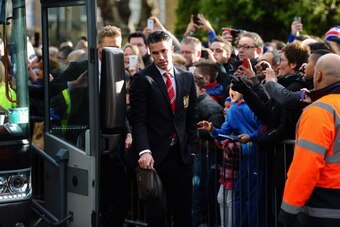 LONDON, ENGLAND - FEBRUARY 22:  Robin Van Persie of Manchester United steps off the team bus to a noisy welcome from the home supporters prior to the Barclays Premier League match between Crystal Palace and Manchester United at Selhurst Park on February 2