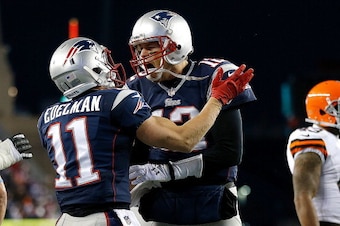 FOXBORO, MA - DECEMBER 8:  Tom Brady #12 of the New England Patriots celebrates the game-winning touchdown with Julian Edelman #11 in the 4th quarter at Gillette Stadium on December 8, 2013 in Foxboro, Massachusetts. (Photo by Jim Rogash/Getty Images)