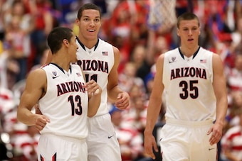 TUCSON, AZ - FEBRUARY 26:  (L-R) Nick Johnson #13, Aaron Gordon #11 and Kaleb Tarczewski #35 of the Arizona Wildcats react after scoring against the California Golden Bears during the second half of the college basketball game at McKale Center on February