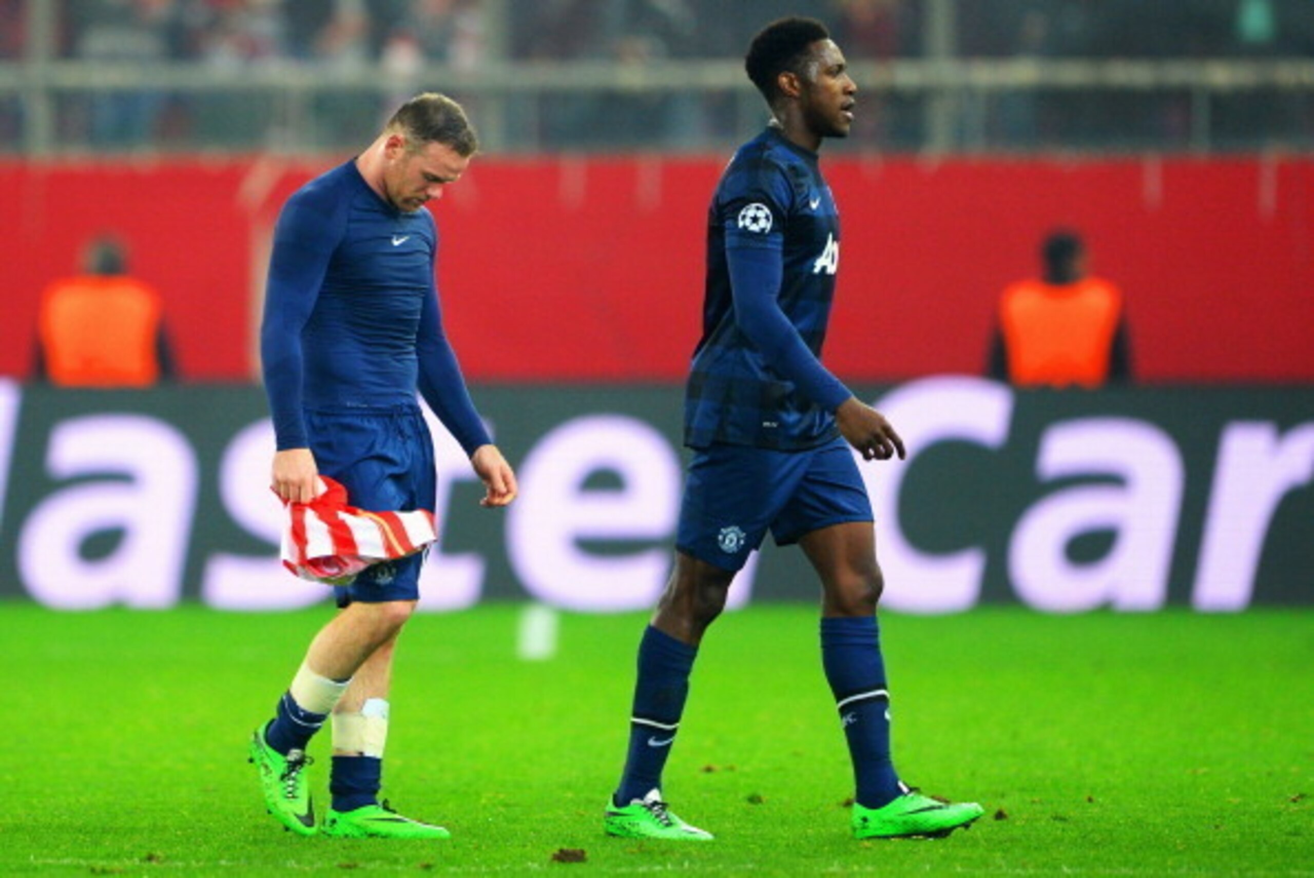 PIRAEUS, GREECE - FEBRUARY 25:  Danny Welbeck (R) and Wayne Rooney (L) of Manchester United leave the field at the end of the UEFA Champions League Round of 16 first leg match between Olympiacos FC and Manchester United at Karaiskakis Stadium on February 