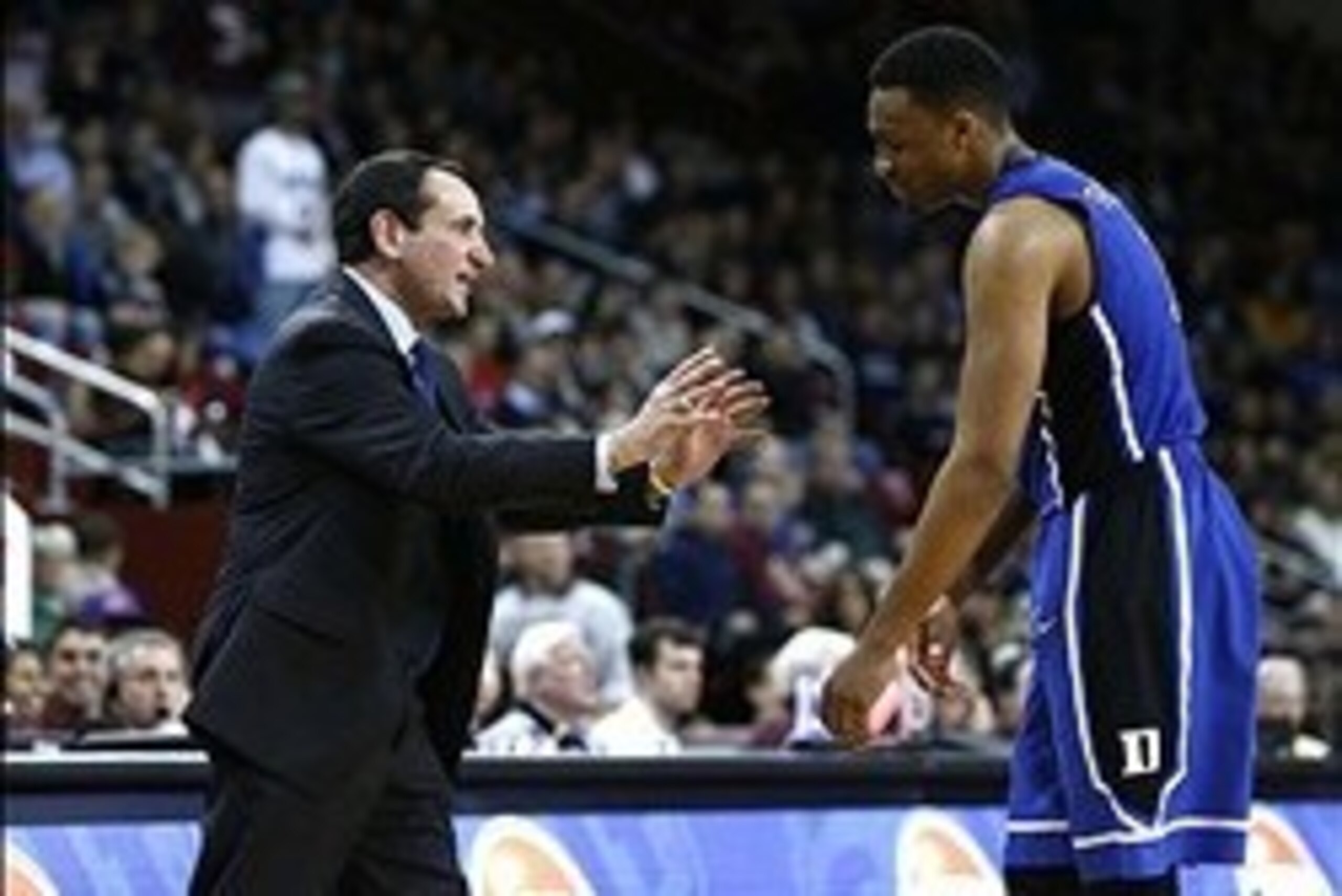 Feb 8, 2014; Chestnut Hill, MA, USA; Duke Blue Devils head coach Mike Krzyzewski reacts to a foul called against forward Jabari Parker (1) during the second half of a game against the Boston College Eagles at Silvio O. Conte Forum. Mandatory Credit: Mark 