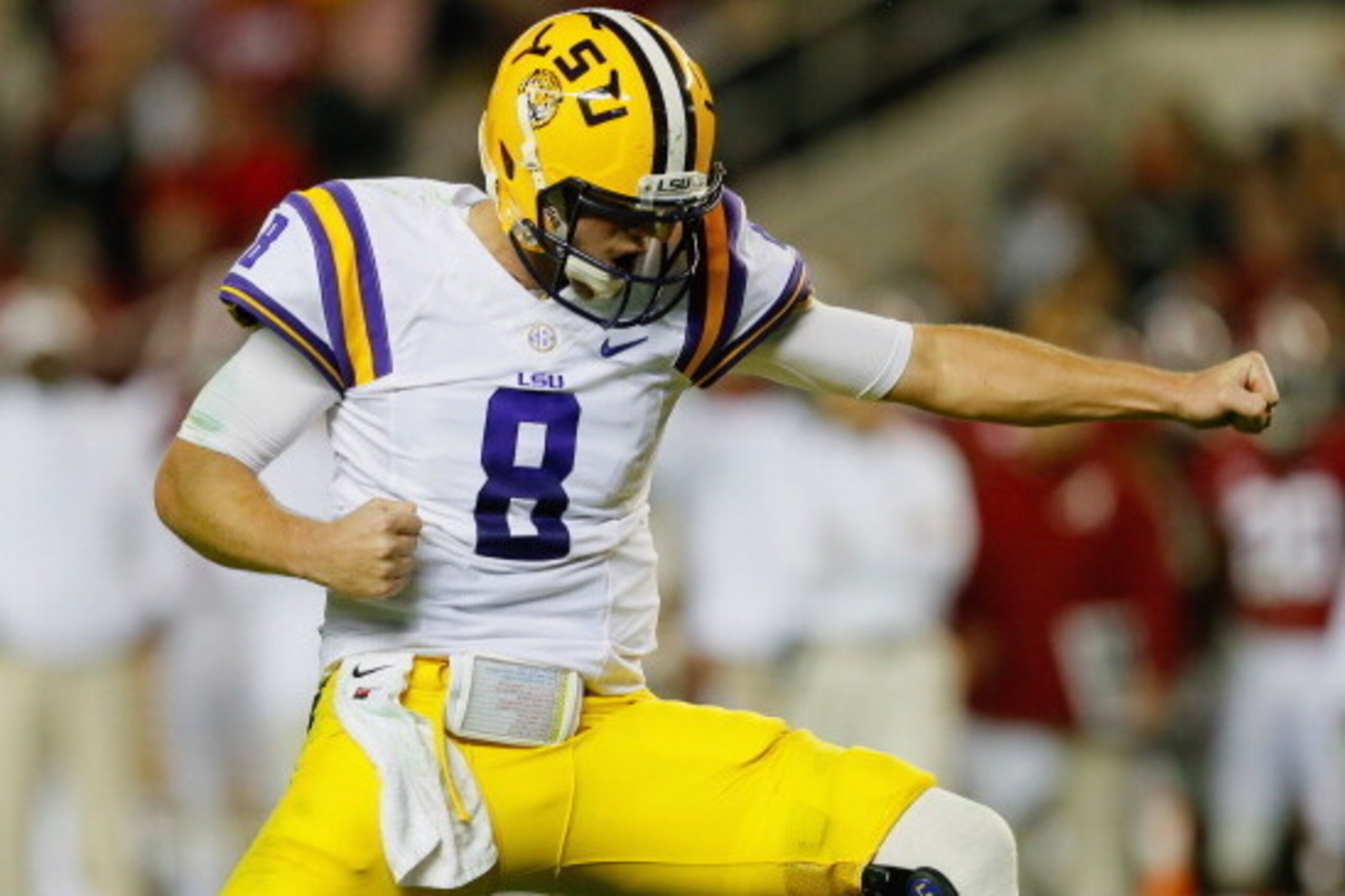 TUSCALOOSA, AL - NOVEMBER 09:  Zach Mettenberger #8 of the LSU Tigers celebrates a second quarter touchdown against the Alabama Crimson Tide during the game at Bryant-Denny Stadium on November 9, 2013 in Tuscaloosa, Alabama.  (Photo by Kevin C. Cox/Getty 