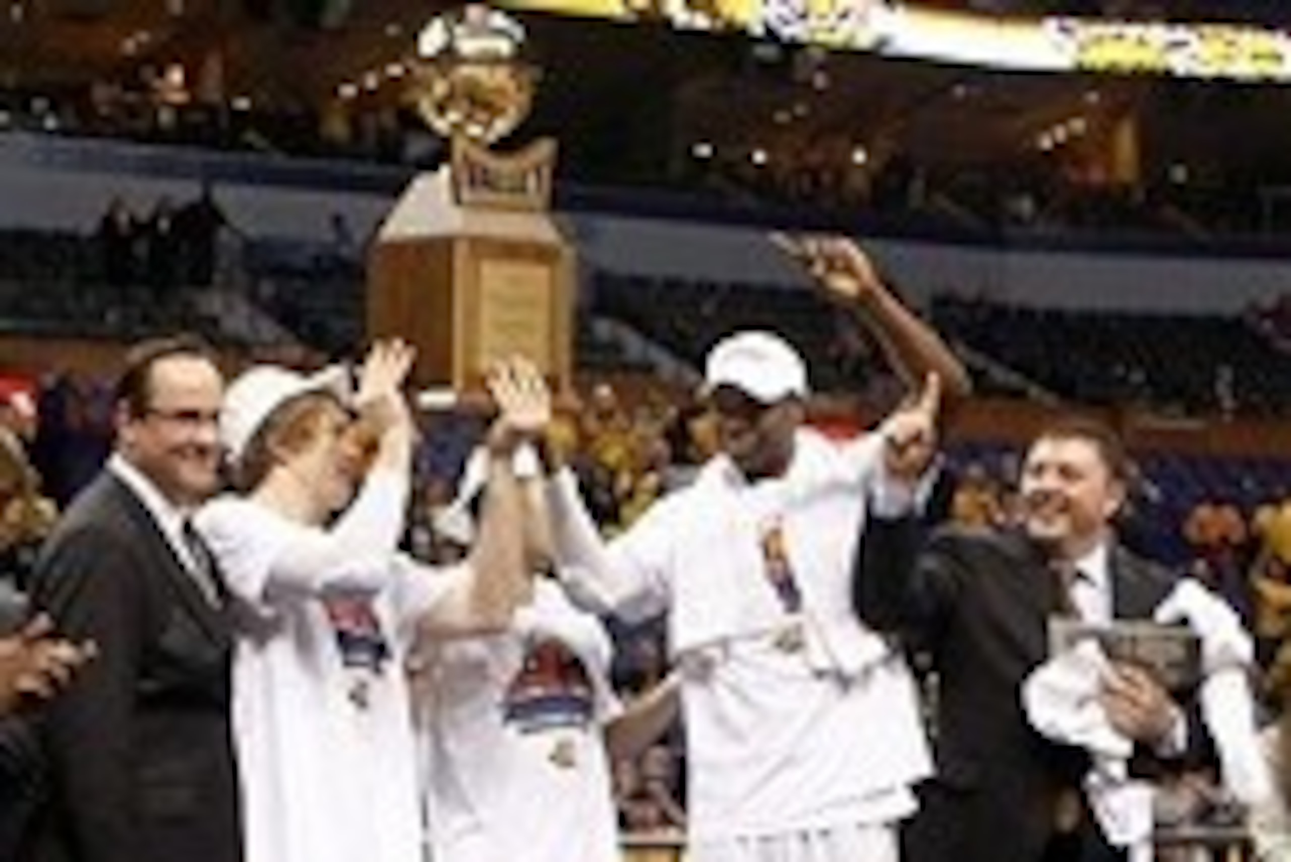 Mar 9, 2014; St. Louis, MO, USA;  Wichita State Shockers celebrate defeated the Indiana State Sycamores 83-69 to win the Missouri Valley Conference basketball tournament at Scotttrade Center.. Mandatory Credit: Scott Kane-USA TODAY Sports