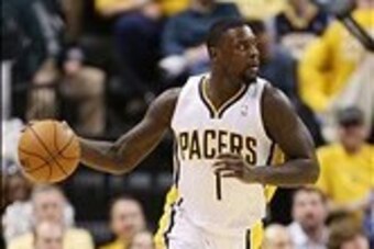 Feb 3, 2014; Indianapolis, IN, USA; Indiana Pacers guard Lance Stephenson (1) brings the ball up court against the Orlando Magic at Bankers Life Fieldhouse. Indiana defeats Orlando 98-79. Mandatory Credit: Brian Spurlock-USA TODAY Sports