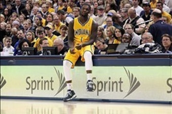 Jan 16, 2014; Indianapolis, IN, USA; Indiana Pacers guard Lance Stephenson (1) waits to check into the game against the New York Knicks at Bankers Life Fieldhouse. Indiana defeats New York 117- 89. Mandatory Credit: Brian Spurlock-USA TODAY Sports