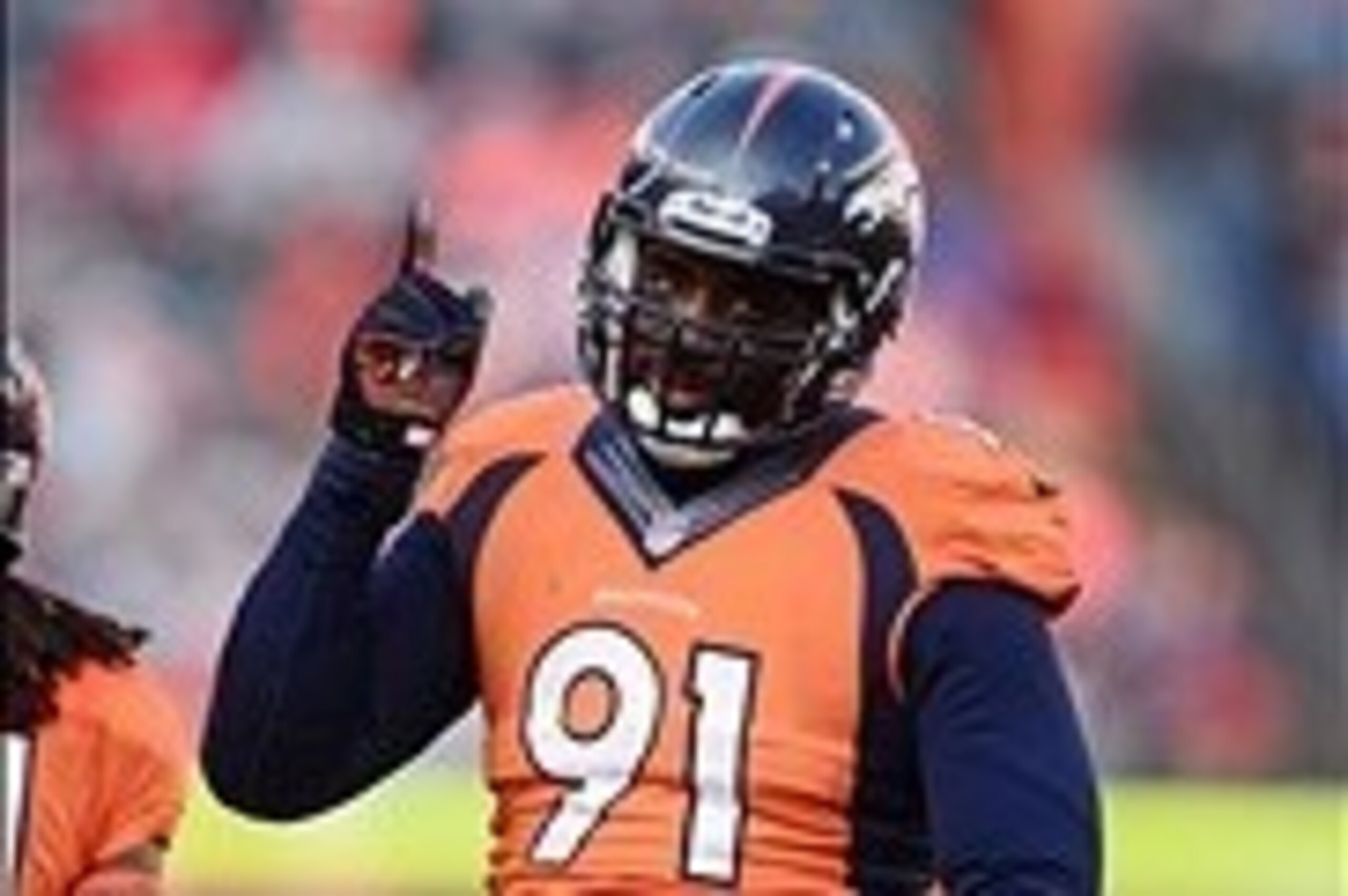 Dec 8, 2013; Denver, CO, USA; Denver Broncos defensive end Robert Ayers (91) reacts to a tackle in the second quarter against the Tennessee Titans at Sports Authority Field at Mile High. The Broncos defeated the Titans 51-28. Mandatory Credit: Ron Chenoy-