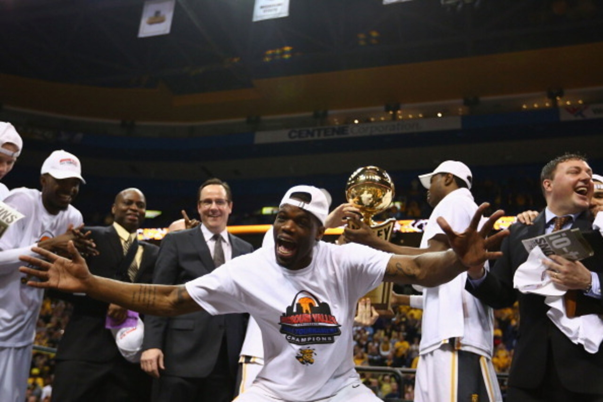 ST. LOUIS, MO - MARCH 9: Chadrack Lufile #0 of the Wichita State Shockers celebrates after beating the Indiana State Sycamores in the MVC Basketball Tournament Championship game at the Scottrade Center on March 9, 2014 in St. Louis, Missouri.  The Shocker