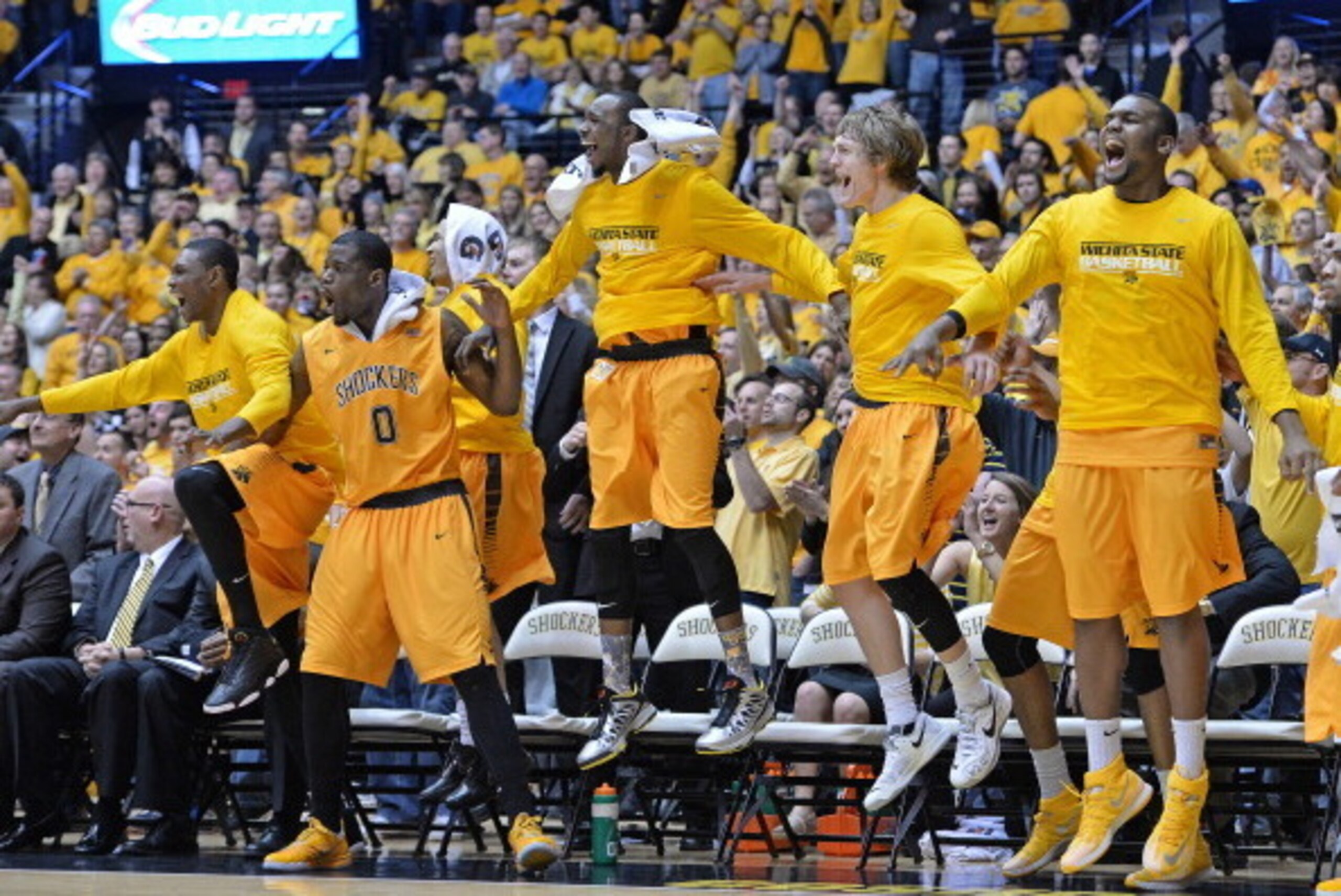 WICHITA, KS - FEBRUARY 22:  The Wichita State Shockers bench celebrates after defeating the Drake Bulldogs to win the Missouri Valley Conference on February 22, 2014 at Charles Koch Arena in Wichita, Kansas.  Wichita State won 83-54.  (Photo by Peter Aike