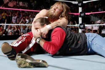 Daniel Bryan attacks Shawn Michaels.