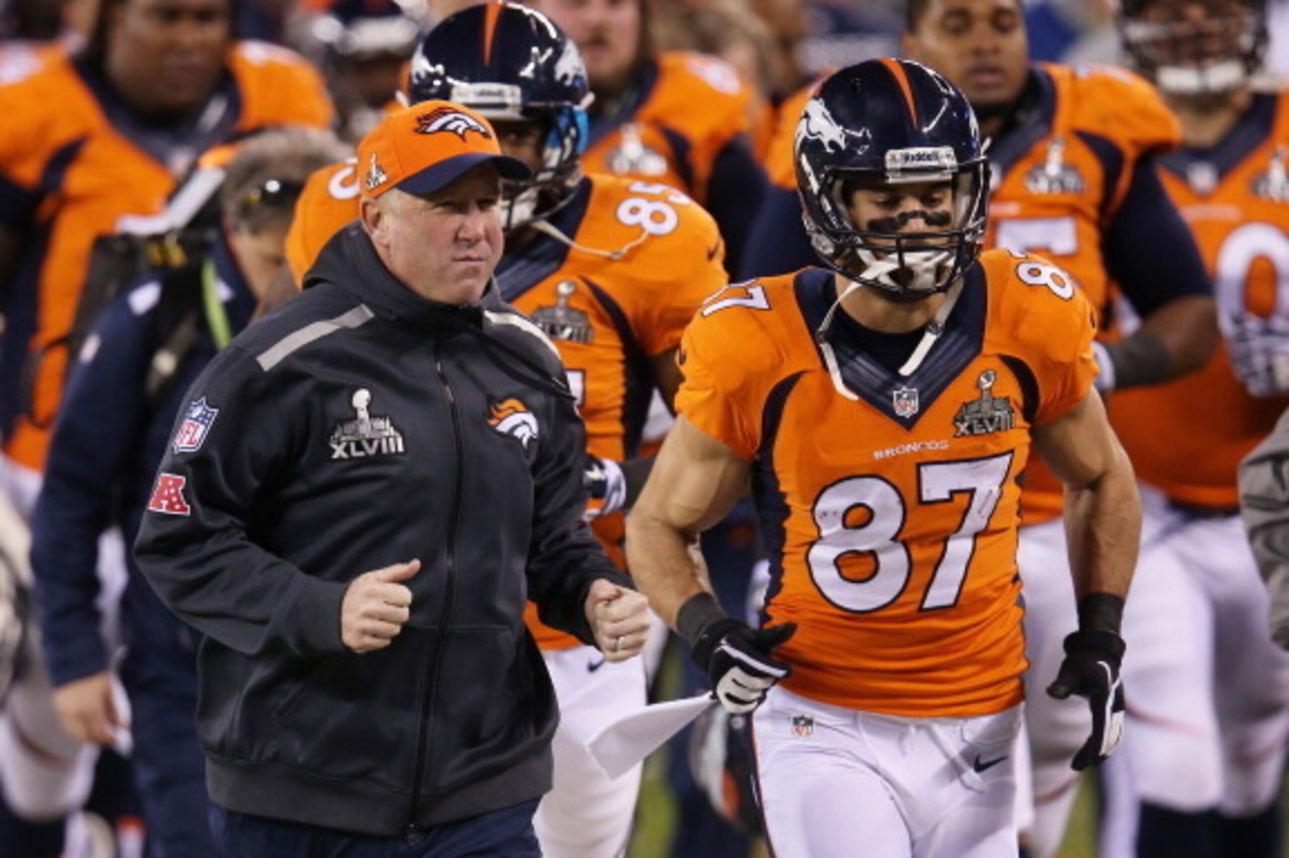 EAST RUTHERFORD, NJ - FEBRUARY 02: (L-R) Head coach John Fox of the Denver Broncos and wide receiver Eric Decker #87 run off the field at the end of the half during Super Bowl XLVIII at MetLife Stadium on February 2, 2014 in East Rutherford, New Jersey.  