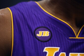 DALLAS, TX - FEBRUARY 24:  Kobe Bryant #24 of the Los Angeles Lakers wears a JB patch in memory of Dr. Jerry Buss at American Airlines Center on February 24, 2013 in Dallas, Texas.   NOTE TO USER: User expressly acknowledges and agrees that, by downloadin