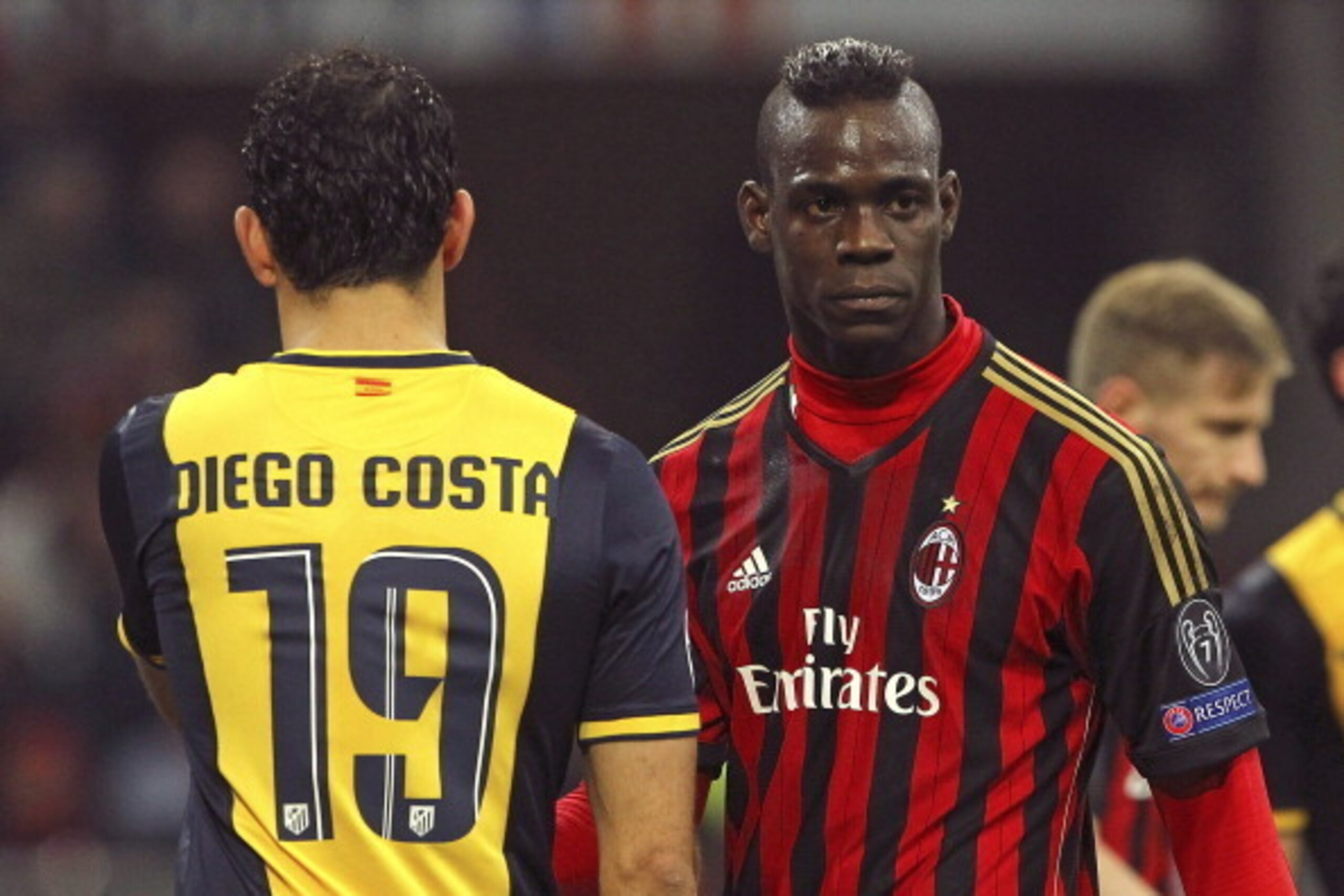MILAN, ITALY - FEBRUARY 19: Mario Balotelli (R) of AC Milan and Diego Costa of Club Atletico de Madrid look on during the UEFA Champions League Round of 16 match between AC Milan and Club Atletico de Madrid at Stadio Giuseppe Meazza on February 19, 2014 MILAN, ITALY - FEBRUARY 19: Mario Balotelli (R) of AC Milan and Diego Costa of Club Atletico de Madrid look on during the UEFA Champions League Round of 16 match between AC Milan and Club Atletico de Madrid at Stadio Giuseppe Meazza on February 19, 2014