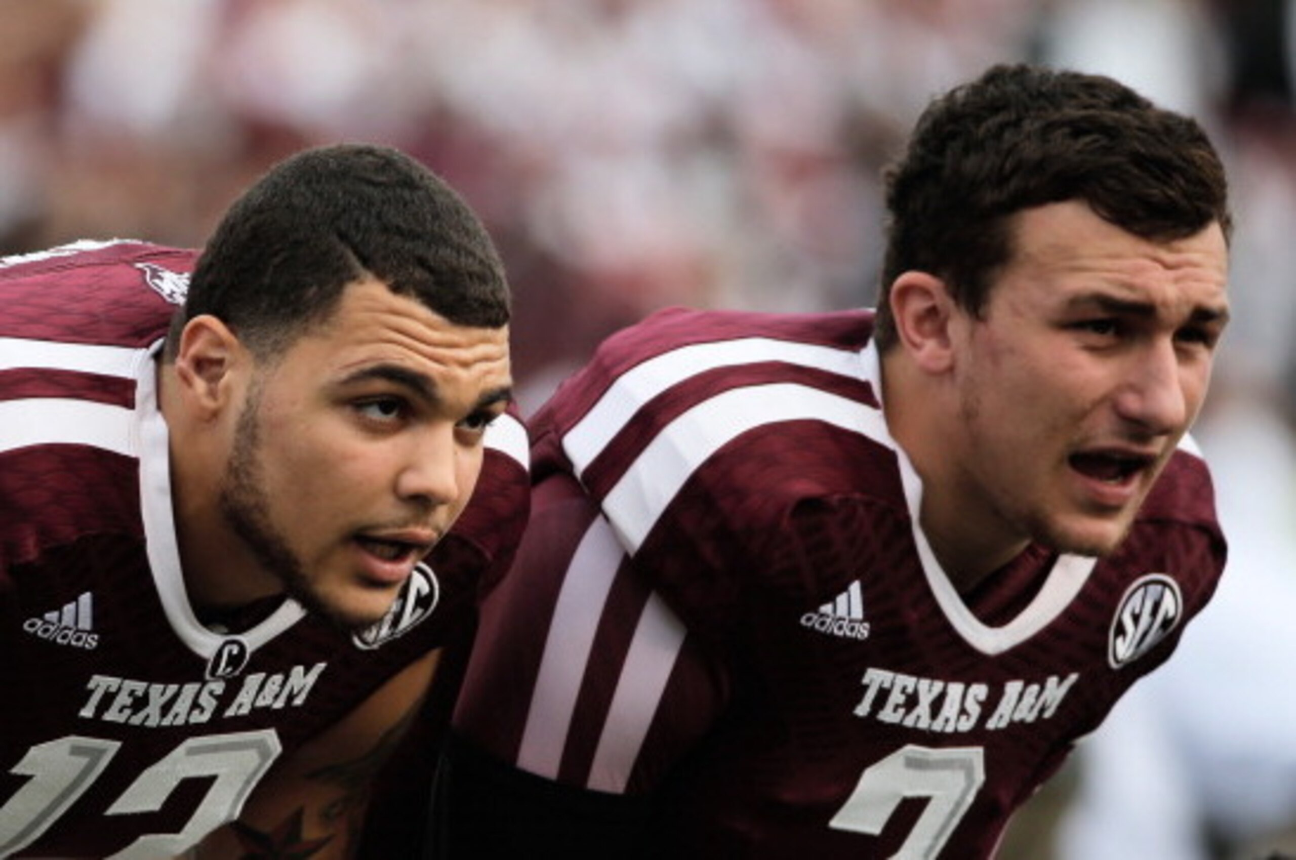 COLLEGE STATION, TX - NOVEMBER 09:  Mike Evans #13 (L) and Johnny Manziel #2 of the Texas A&M Aggies wait on the field before the game against the Mississippi State Bulldogs at Kyle Field on November 9, 2013 in College Station, Texas.  (Photo by Scott Hal