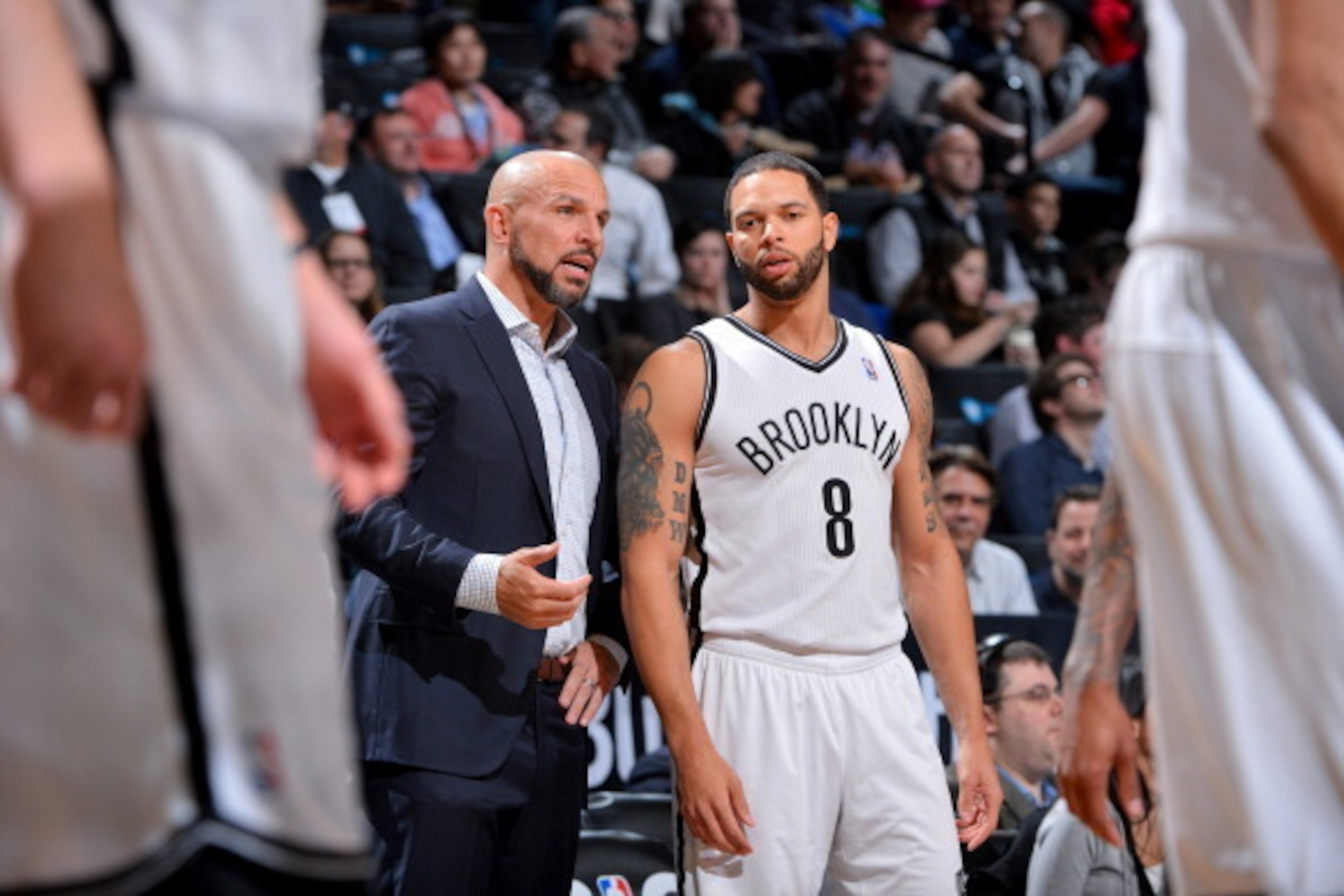 BROOKLYN, NY - MARCH 9: Deron Williams #8 and Head Coach Jason Kidd of the Brooklyn Nets talk on the court during the game against the Sacramento Kings on March 9, 2014 at the Barclays Center in Brooklyn, New York. NOTE TO USER: User expressly acknowledge