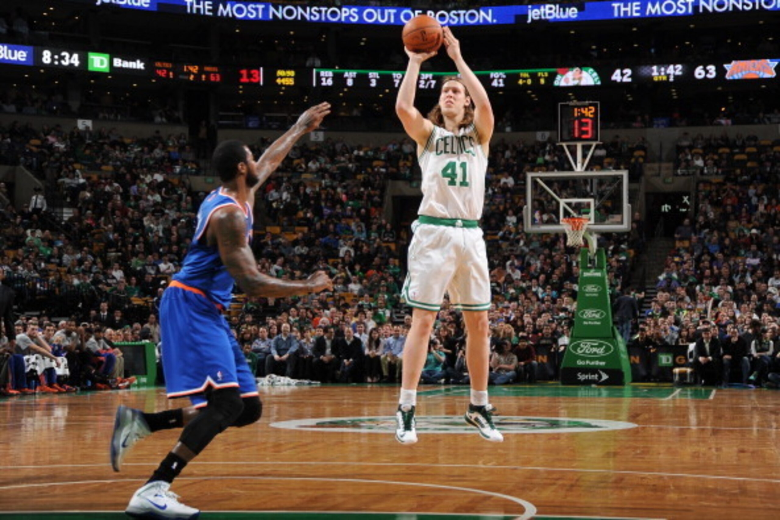 BOSTON, MA - MARCH 12: Kelly Olynyk #41 of the Boston Celtics shoots against the New York Knicks on March 12, 2014 at the TD Garden in Boston, Massachusetts.  NOTE TO USER: User expressly acknowledges and agrees that, by downloading and or using this phot