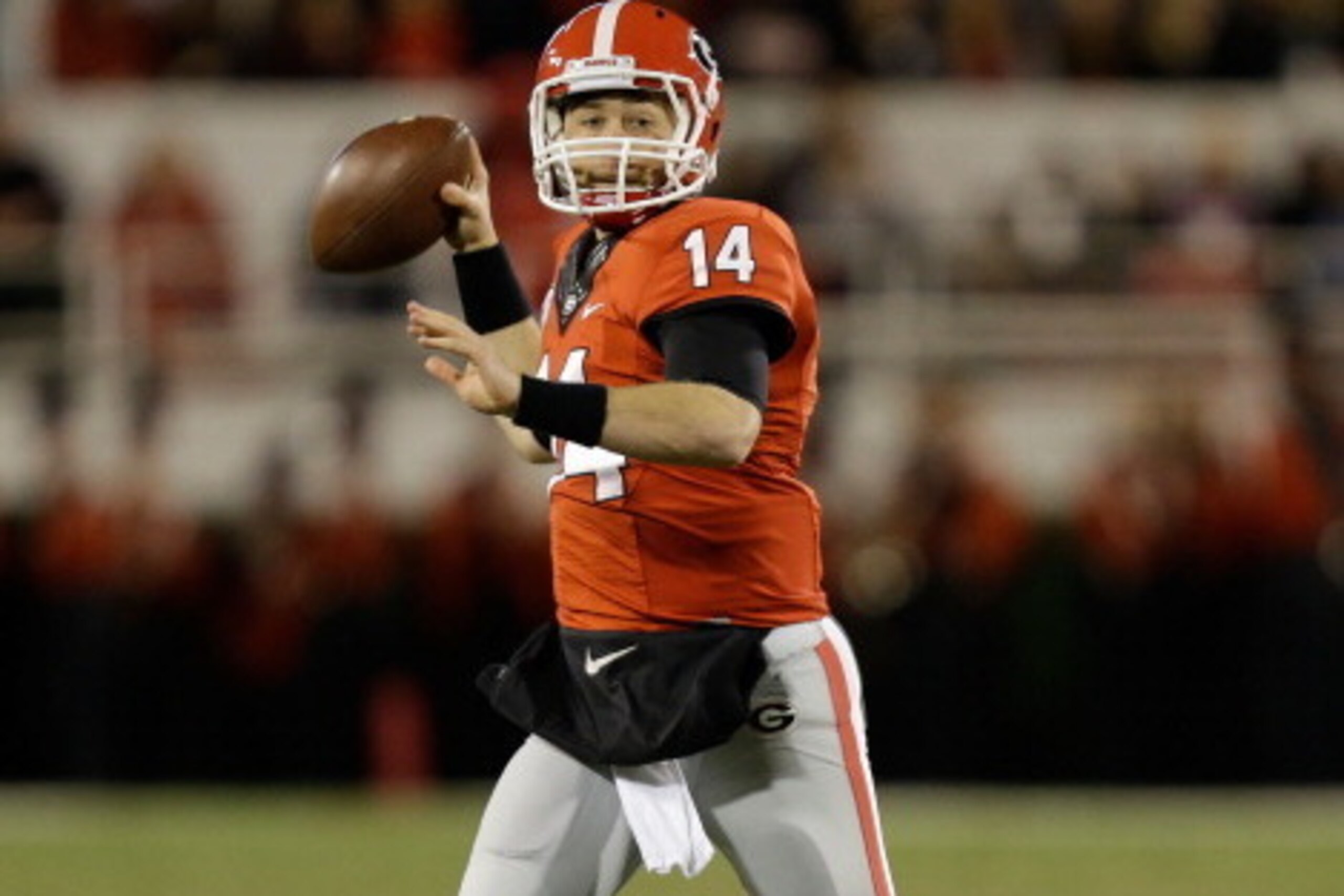 ATHENS, GA - NOVEMBER 23:  Quarterback Hutson Mason #14 of the Georgia Bulldogs throws a pass during the game against the Kentucky Wildcats at Sanford Stadium on November 23, 2013 in Athens, Georgia.  (Photo by Mike Zarrilli/Getty Images)