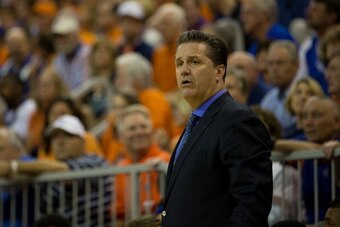 GAINESVILLE, FL - MARCH 08: Head coach John Calipari of the Kentucky Wildcats reactsduring the first half of the game against the Florida Gators at the Stephen C. O'Connell Center on March 8, 2014 in Gainesville, Florida. (Photo by Rob Foldy/Getty Images)