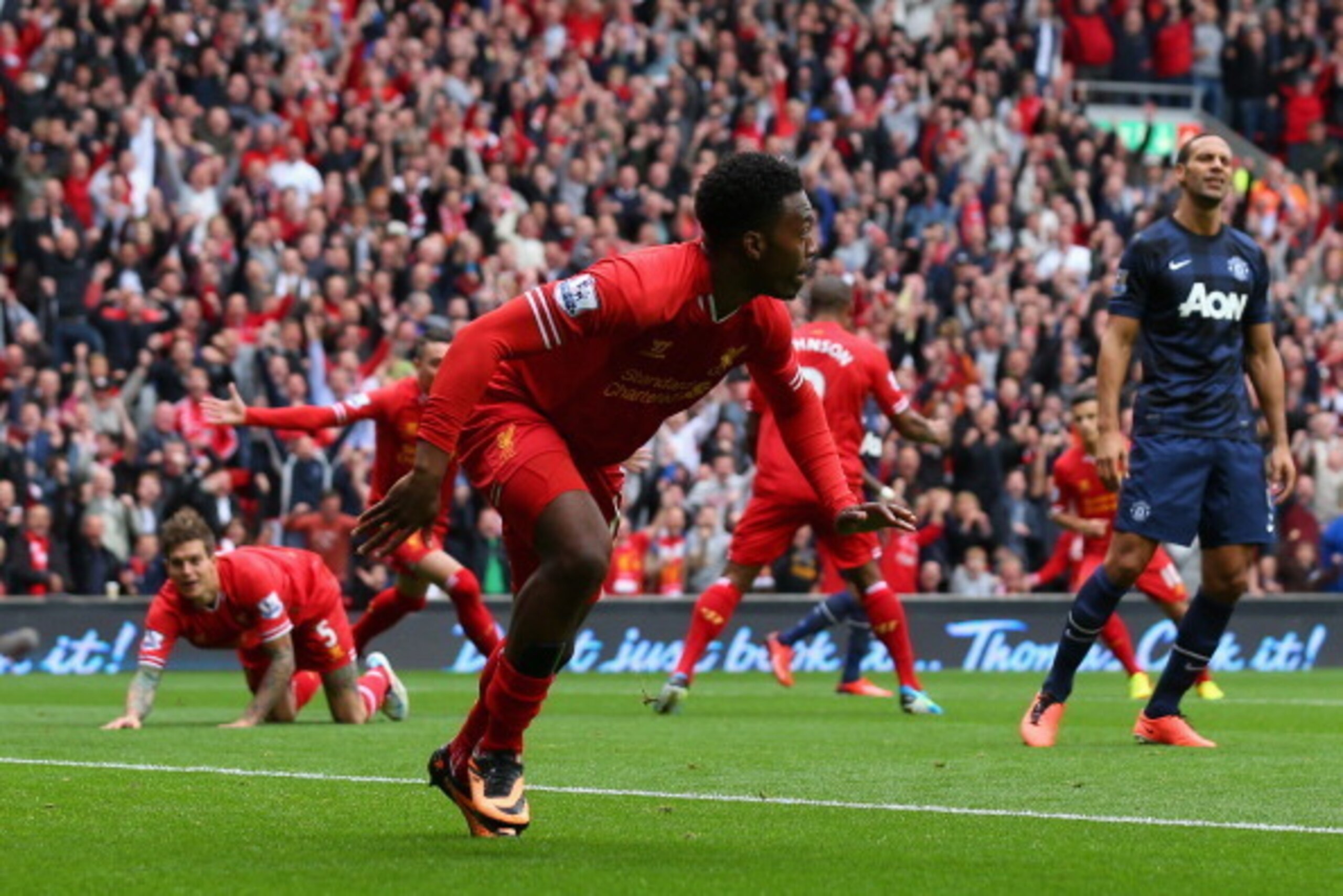 LIVERPOOL, ENGLAND - SEPTEMBER 01: Daniel Sturridge of Liverpool celebrates scoring the opening goal during the Barclays Premier League match between Liverpool and Manchester United at Anfield on September 01, 2013 in Liverpool, England. (Photo by Alex Li