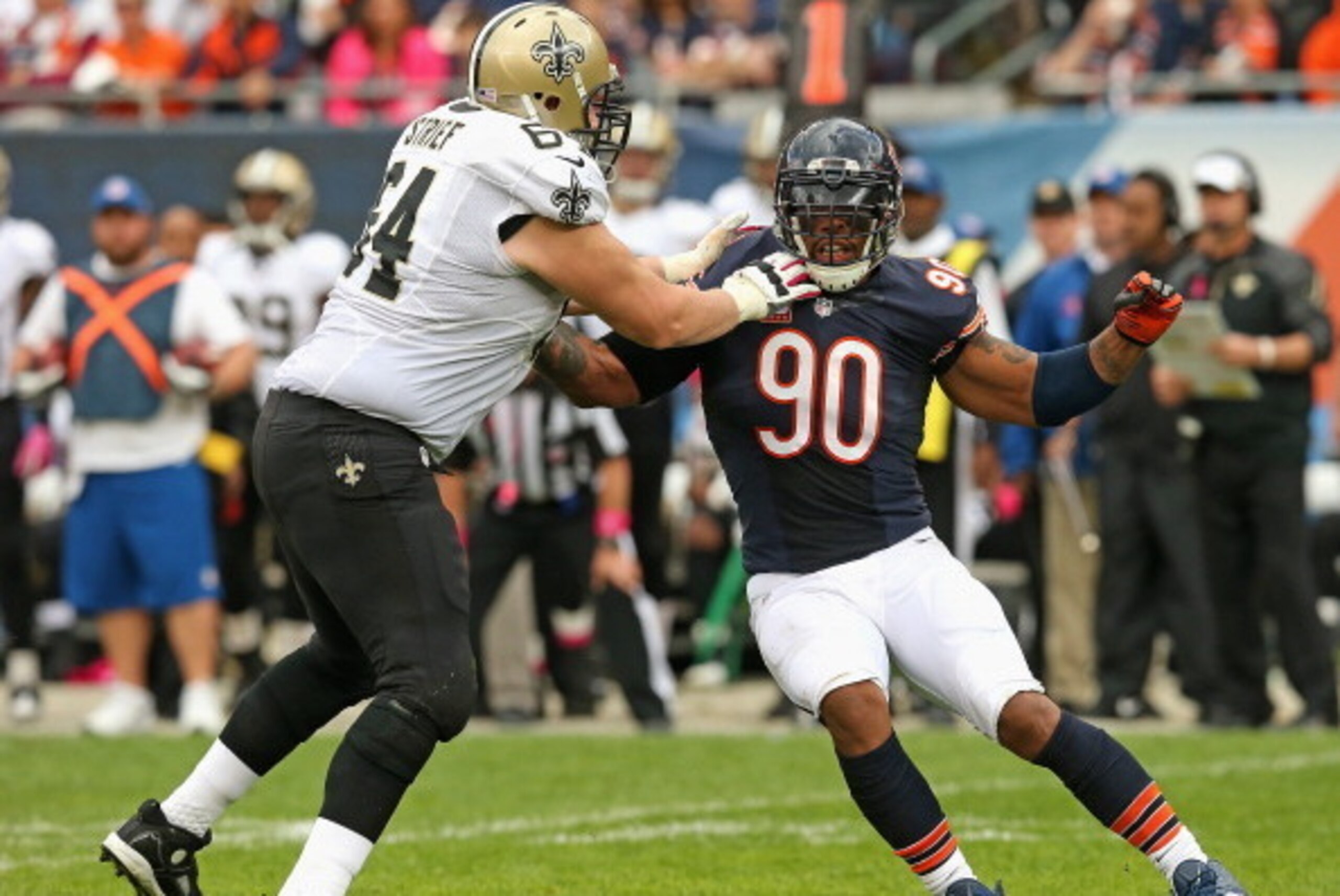 CHICAGO, IL - OCTOBER 06:  Julius Peppers #90 of the Chicago Bears rushes against Zach Strief #64 of the New Orleans Saints at Soldier Field on October 6, 2013 in Chicago, Illinois. The Saints defeated the Bears 26-18.  (Photo by Jonathan Daniel/Getty Ima