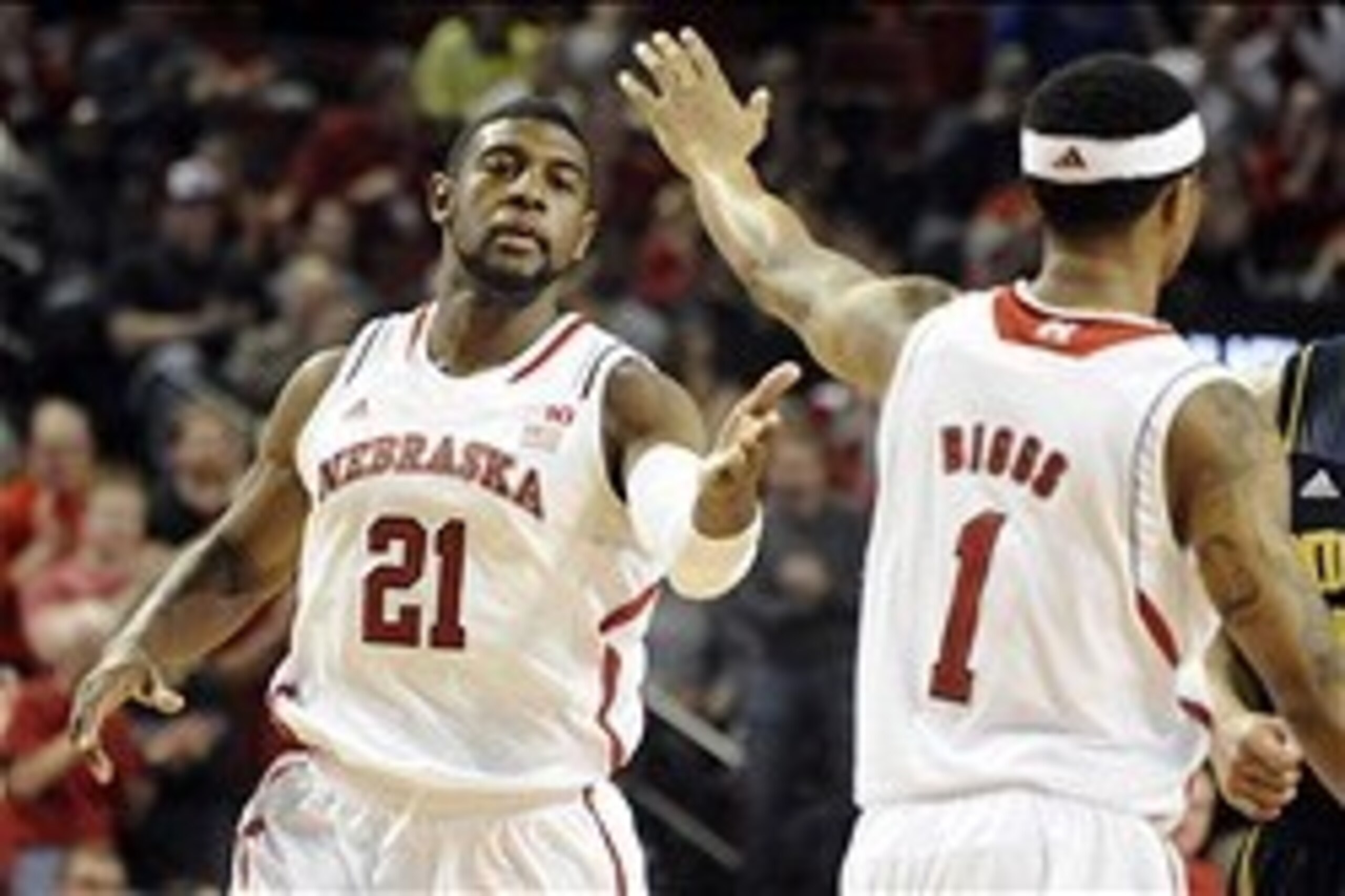 Jan 9, 2014; Lincoln, NE, USA; Nebraska Cornhuskers forward Leslee Smith (21) high five during their NCAA mens basketball game against the Michigan Wolverines at the Pinnacle Bank Arena. Mandatory Credit: Dave Weaver-USA TODAY Sports