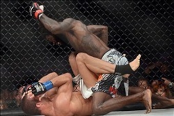 Nov 2, 2013; Long Beach, CA, USA; Daniel Straus (red gloves) and Pat Curran (blue gloves) during their Bellator featherweight world championship fight at the Long Beach Arena. Daniel Strauss won by decision. Mandatory Credit: Jayne Kamin-Oncea-USA TODAY Nov 2, 2013; Long Beach, CA, USA; Daniel Straus (red gloves) and Pat Curran (blue gloves) during their Bellator featherweight world championship fight at the Long Beach Arena. Daniel Strauss won by decision. Mandatory Credit: Jayne Kamin-Oncea-USA TODAY