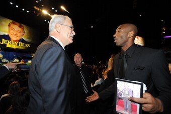 LOS ANGELES, CA - FEBRUARY 20: Phil Jackson and Kobe Bryant speak before the memorial service for Los Angeles Lakers Owner Dr. Jerry Buss at Nokia Theatre LA LIVE on February 21, 2013 in Los Angeles, California. NOTE TO USER: User expressly acknowledges a