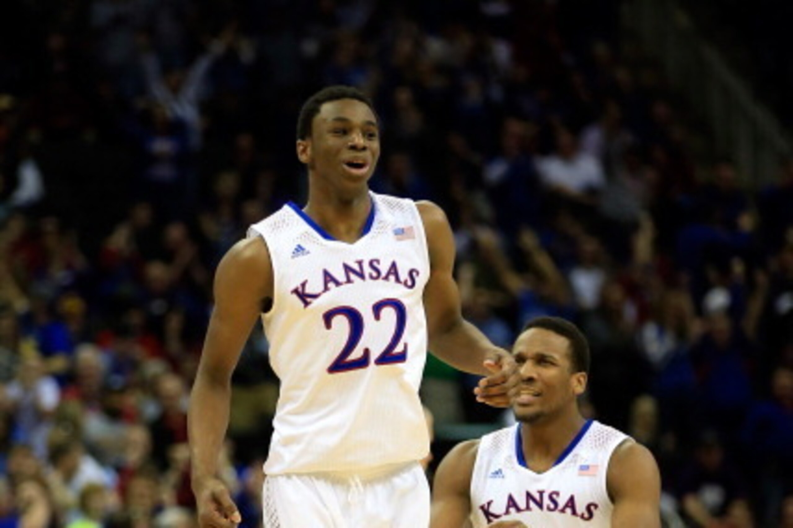 KANSAS CITY, MO - MARCH 13: Andrew Wiggins #22 of the Kansas Jayhawks is congratulated by Wayne Selden, Jr. #1 after dunking on an alley-oop during the Big 12 Basketball Tournament quarterfinal game against the Oklahoma State Cowboys at Sprint Center on KANSAS CITY, MO - MARCH 13: Andrew Wiggins #22 of the Kansas Jayhawks is congratulated by Wayne Selden, Jr. #1 after dunking on an alley-oop during the Big 12 Basketball Tournament quarterfinal game against the Oklahoma State Cowboys at Sprint Center on
