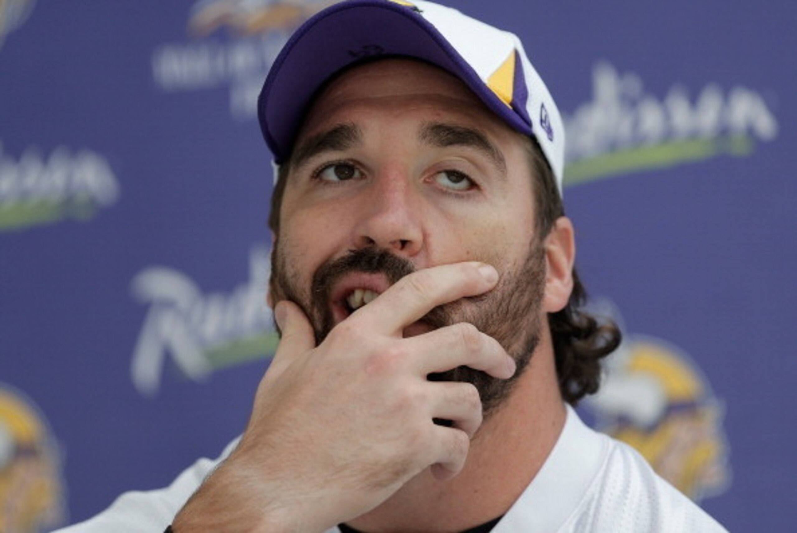 LONDON, ENGLAND - SEPTEMBER 26:  Defensive End Jared Allen speaks to members of the press during a Minnesota Vikings press conference at the Grove Hotel on September 26, 2013 in London, England.  (Photo by Harry Engels/Getty Images)