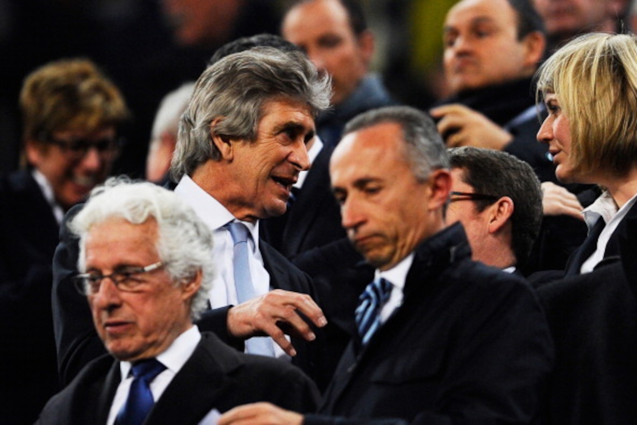 BARCELONA, SPAIN - MARCH 12:  Manuel Pellegrini the Manchester manager watches from the stands due to a two match touchline ban during the UEFA Champions League Round of 16, second leg match between FC Barcelona and Manchester City  at Camp Nou on March 1